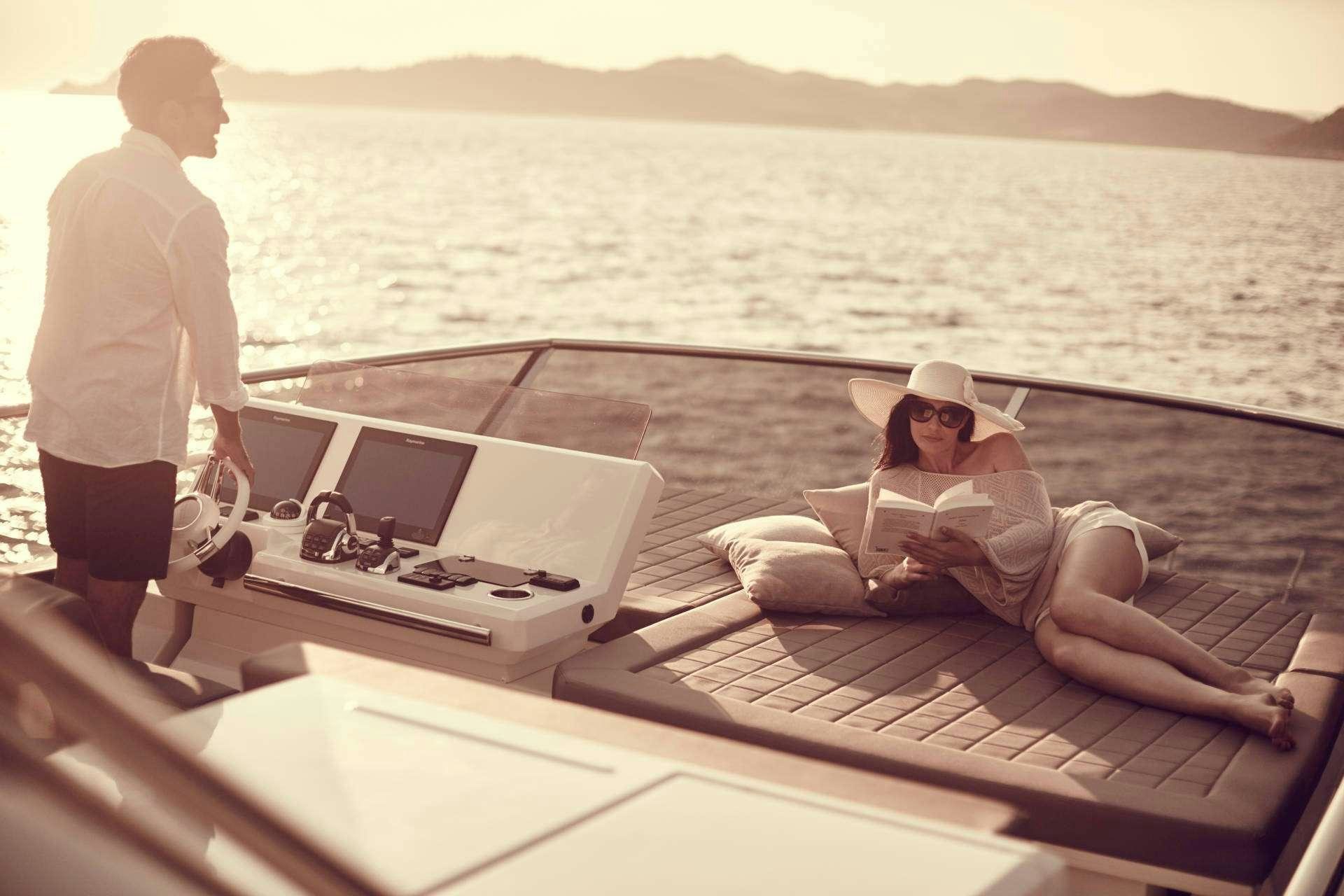 a man and a woman on a boat aboard MO&EUML;T Yacht for Charter