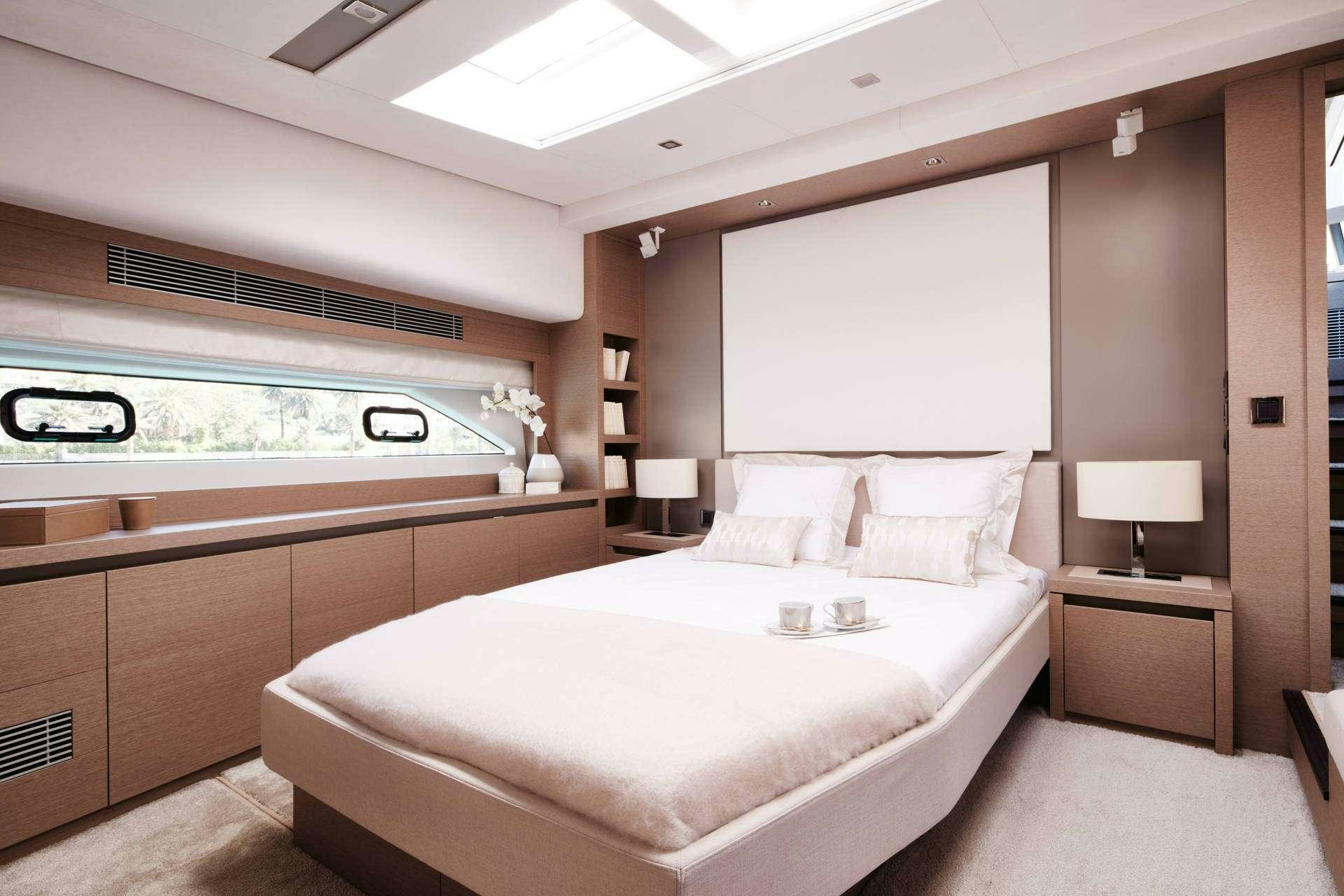 a large bedroom with a large bed aboard MO&EUML;T Yacht for Charter