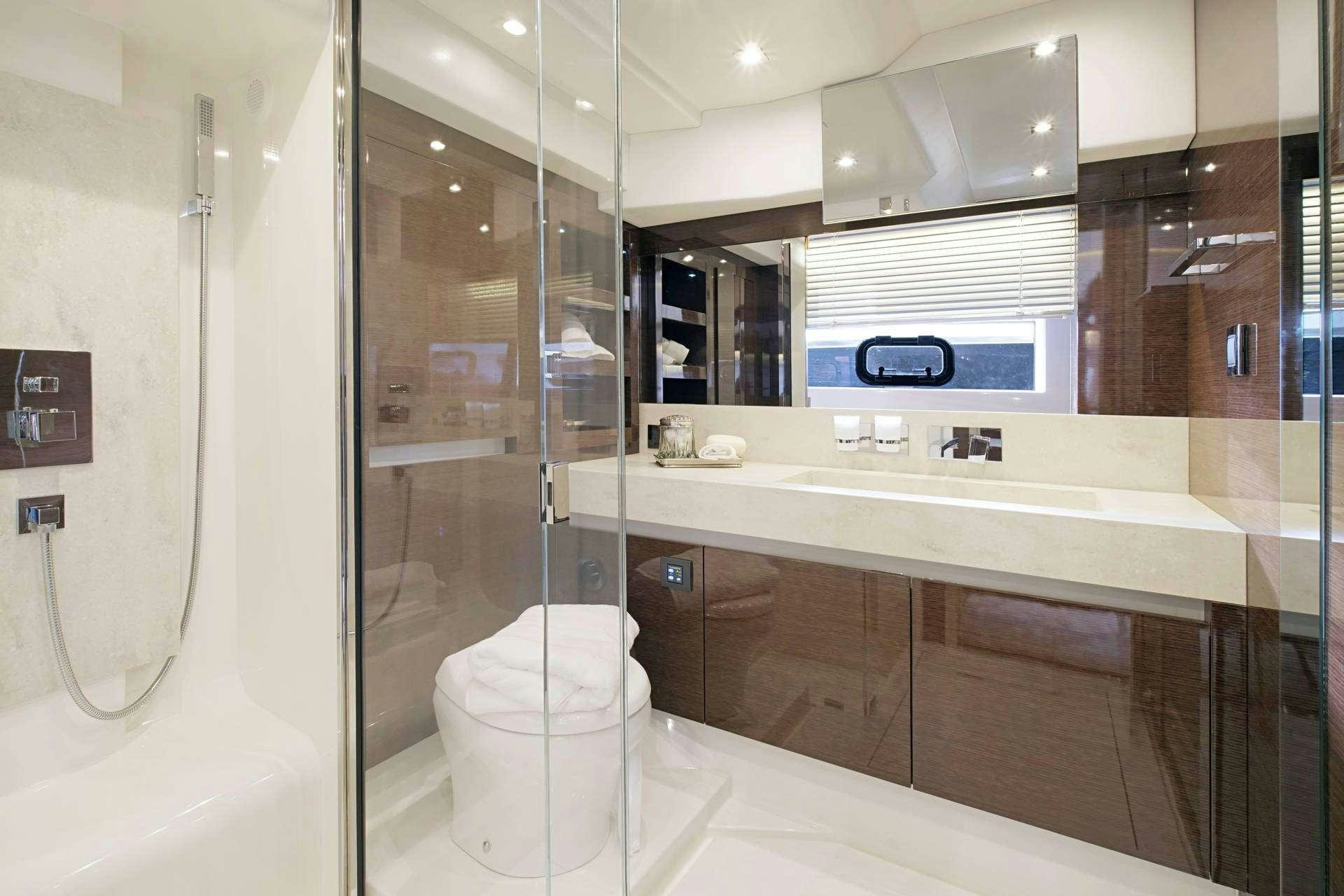 a bathroom with a large shower unit aboard MO&EUML;T Yacht for Charter