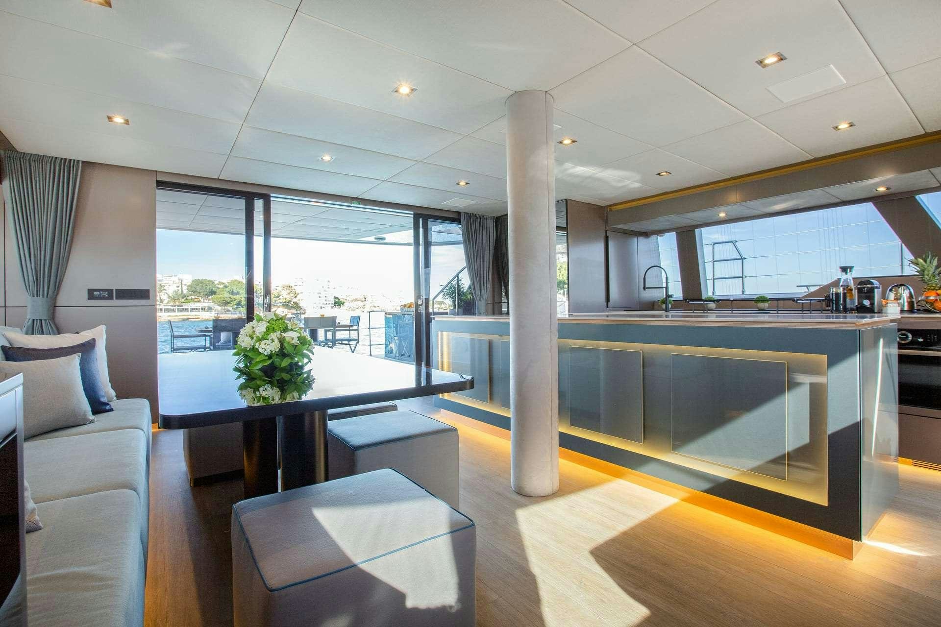 a modern looking living room aboard SUNBREEZE Yacht for Charter