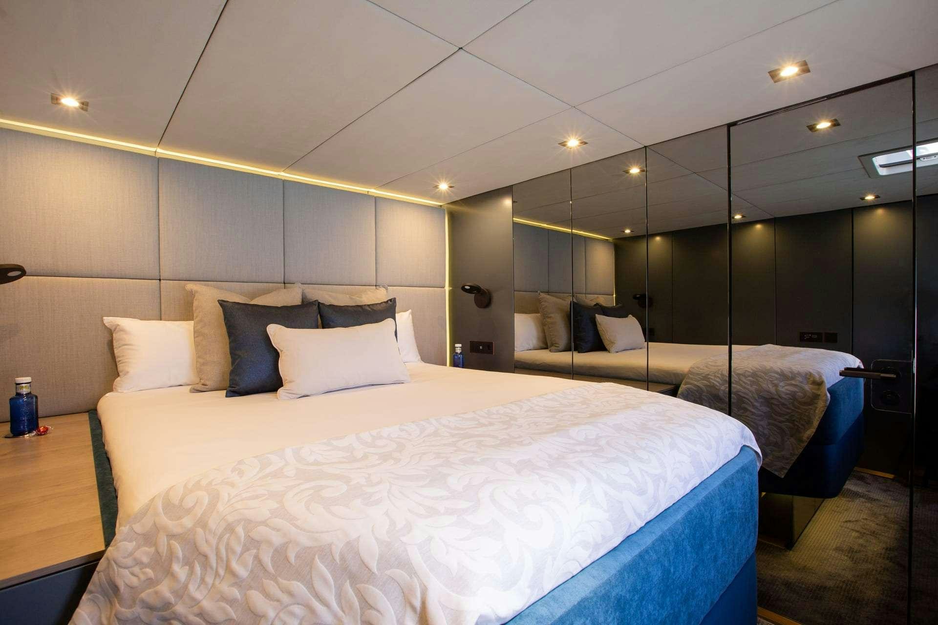 a room with two beds aboard SUNBREEZE Yacht for Charter