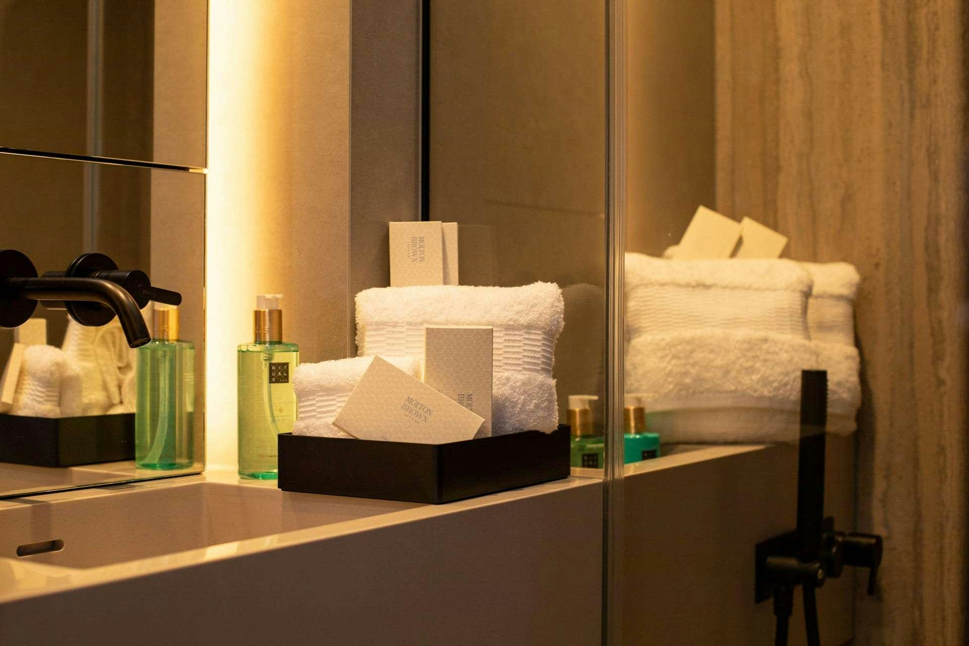 a bathroom with a mirror aboard SUNBREEZE Yacht for Charter