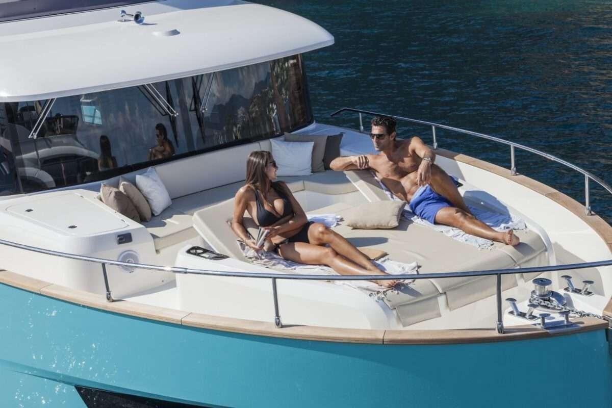 a group of people on a boat aboard MAYBE5 Yacht for Charter