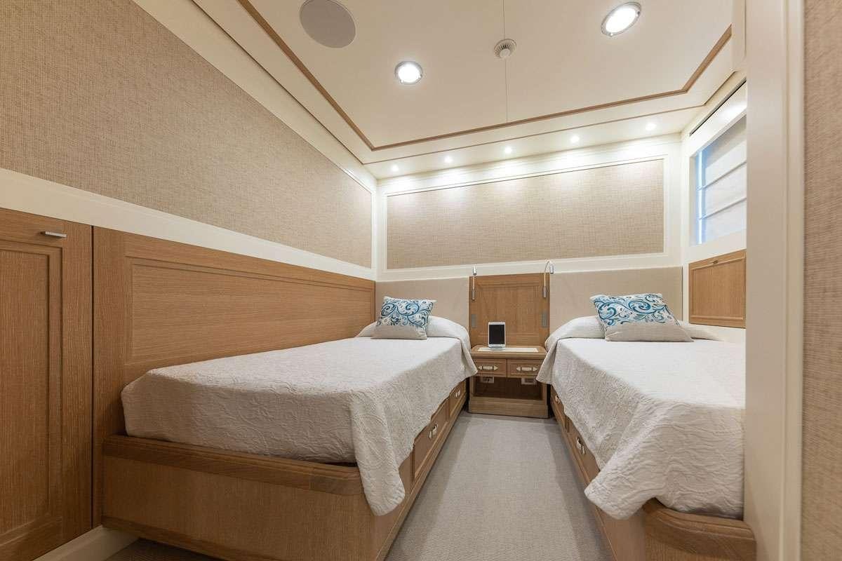a room with two beds aboard MY WAY Yacht for Charter
