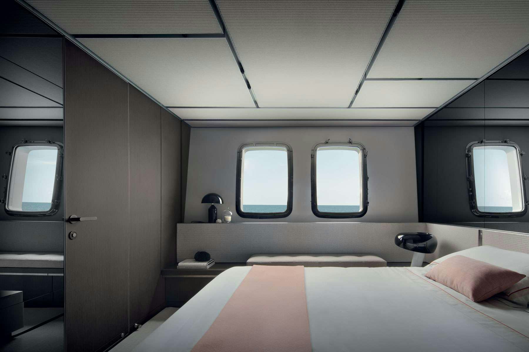 a room with a bed and a window aboard ALMAX Yacht for Charter