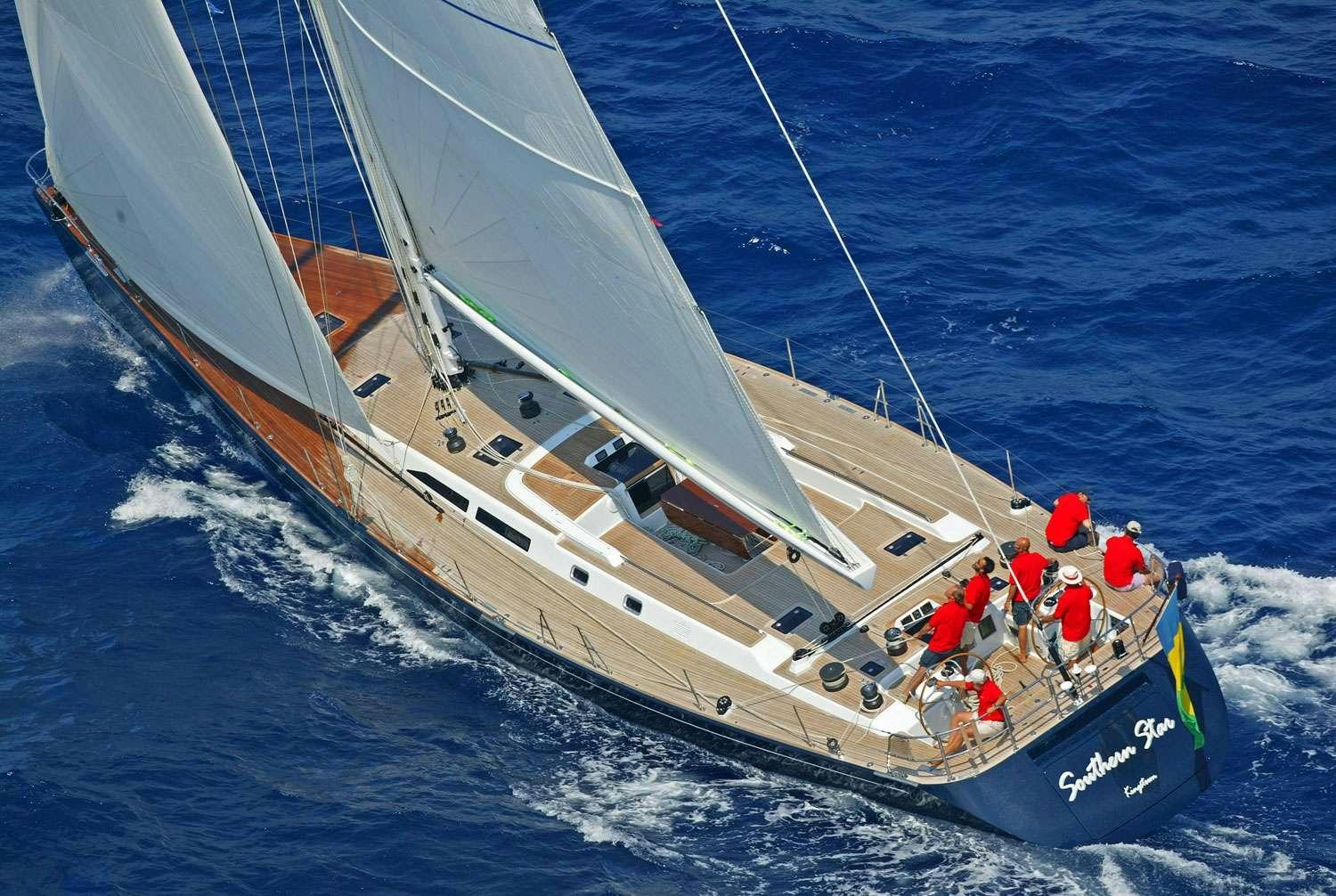 a group of people on a sailboat aboard SOUTHERN STAR Yacht for Charter