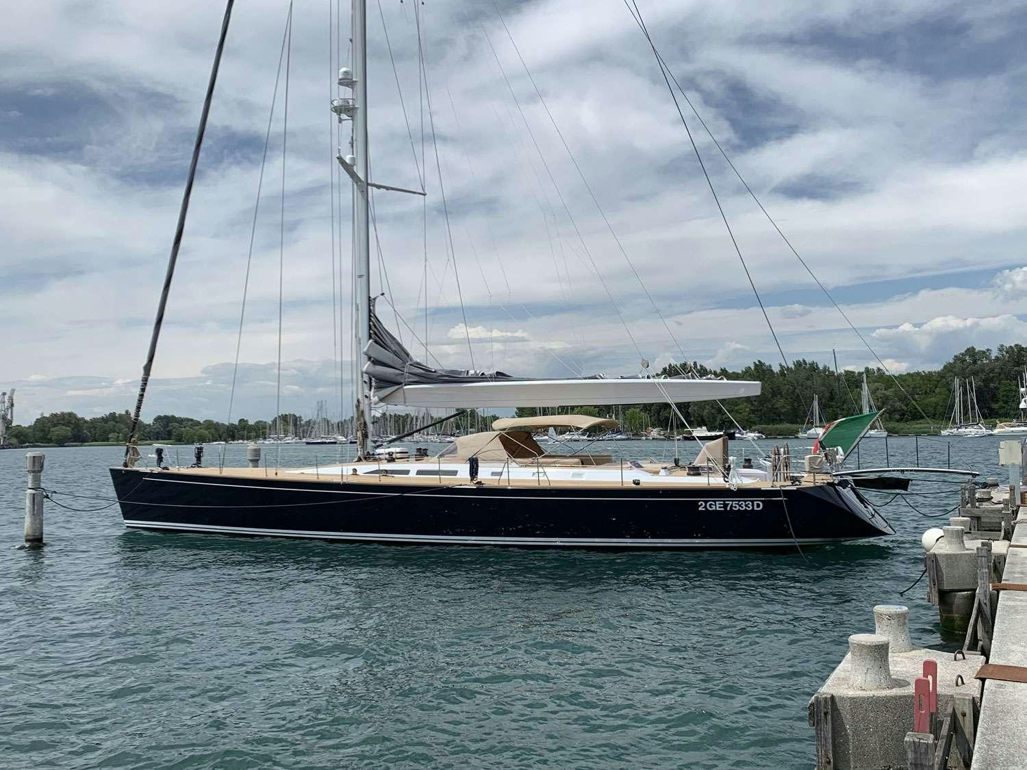 a boat docked at a pier aboard SOUTHERN STAR Yacht for Charter