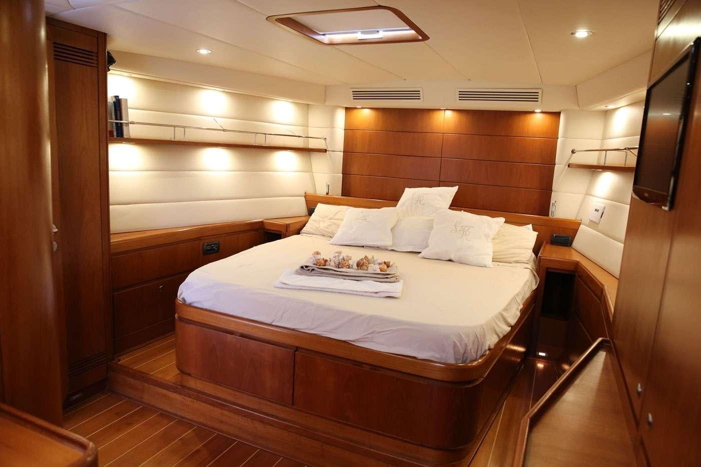 a bed in a room aboard SOUTHERN STAR Yacht for Charter