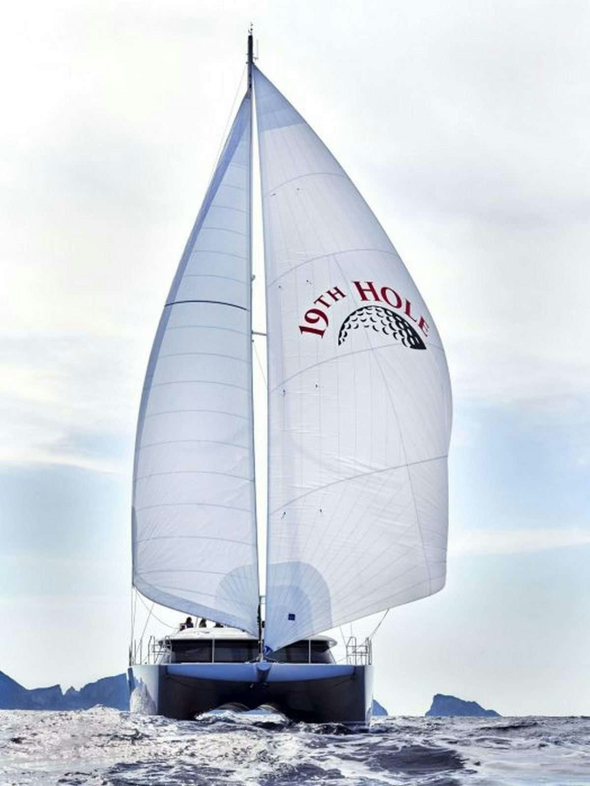 a sailboat on the water aboard 19TH HOLE Yacht for Charter