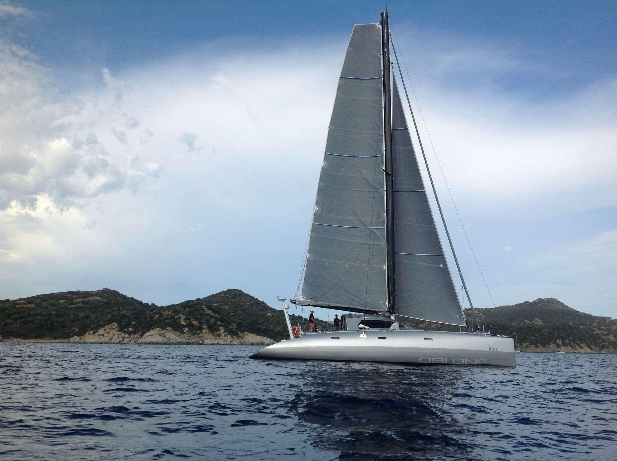 a sailboat on the water aboard Obi One Yacht for Charter