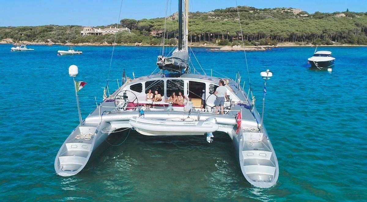 a boat with people on it aboard Obi One Yacht for Charter