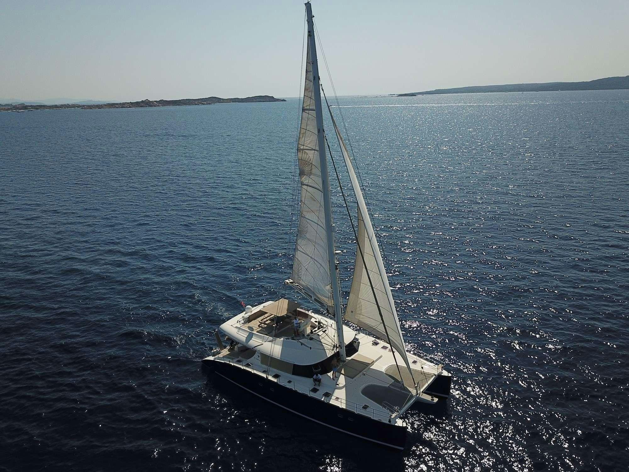 a sailboat in the water aboard Free Spirit Yacht for Charter