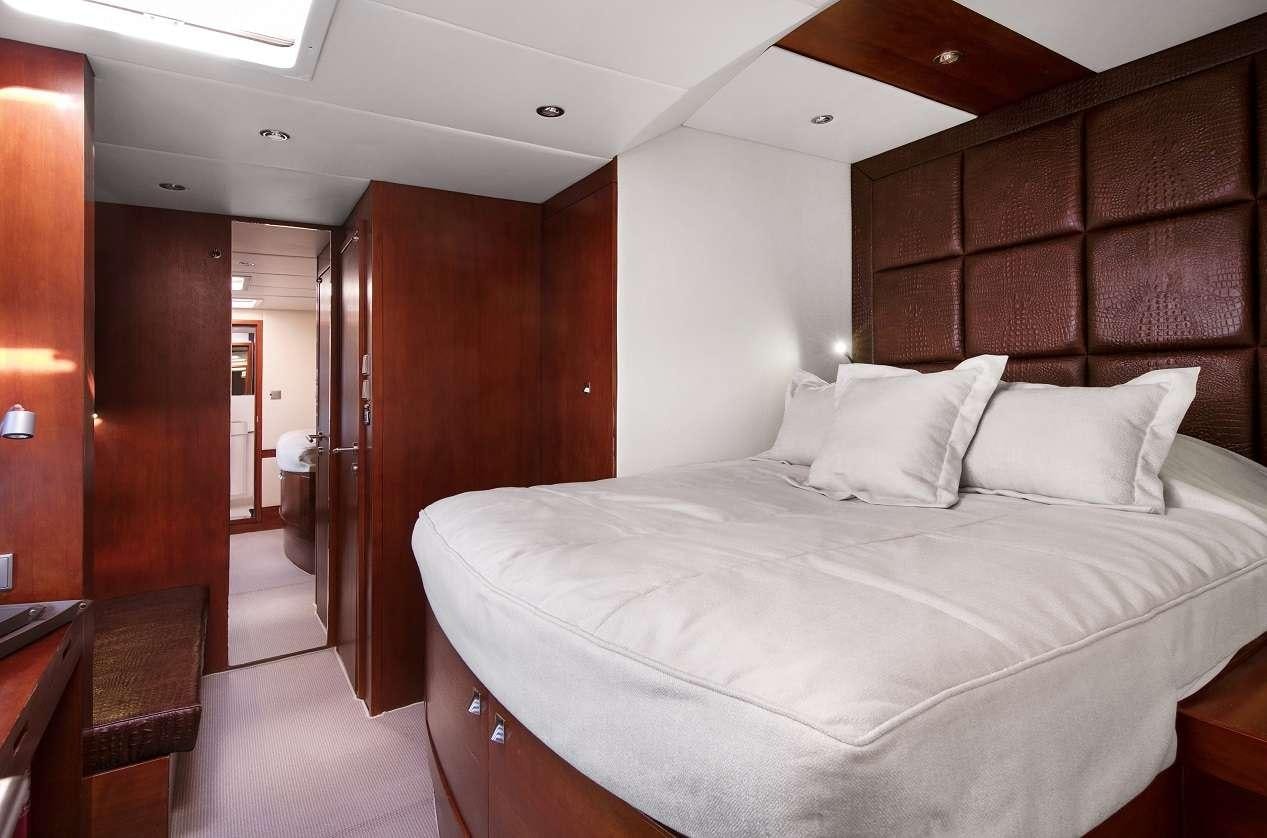 a bed in a room aboard Free Spirit Yacht for Charter