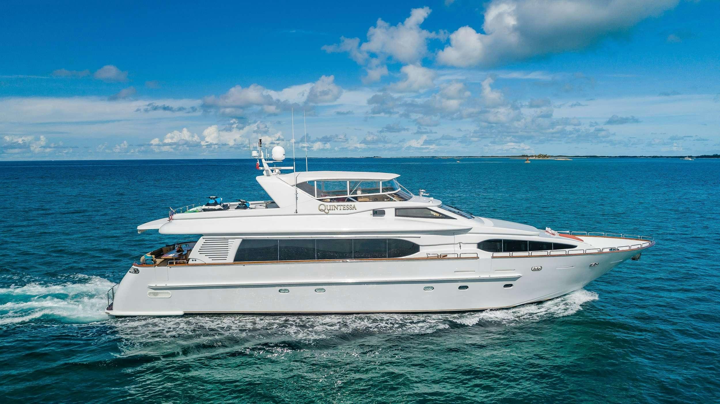a white yacht in the water aboard QUINTESSA Yacht for Charter