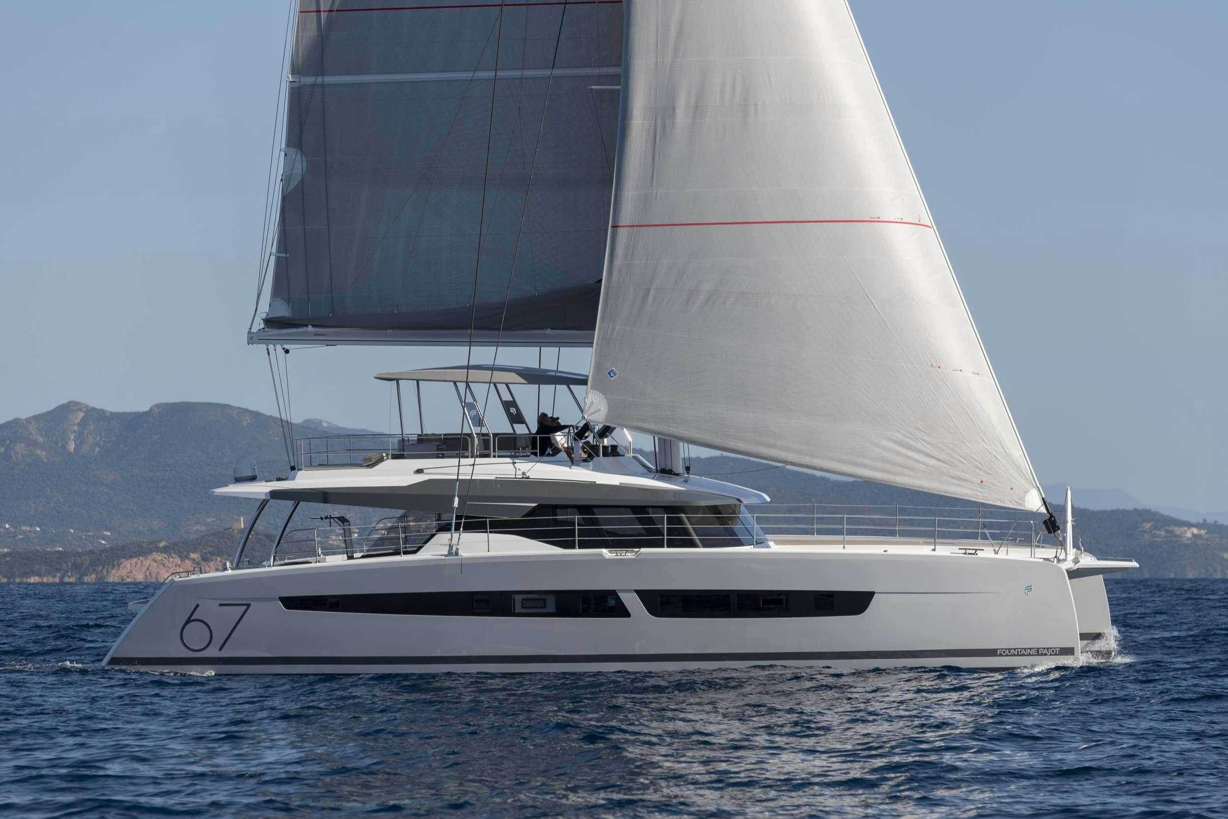 a white boat on the water aboard INSPIRANTE Yacht for Charter