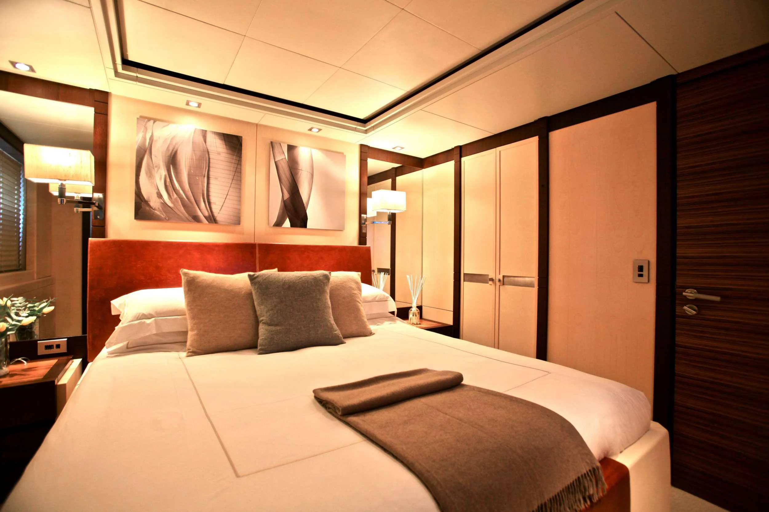 a hotel room with a bed aboard ALALYA Yacht for Charter