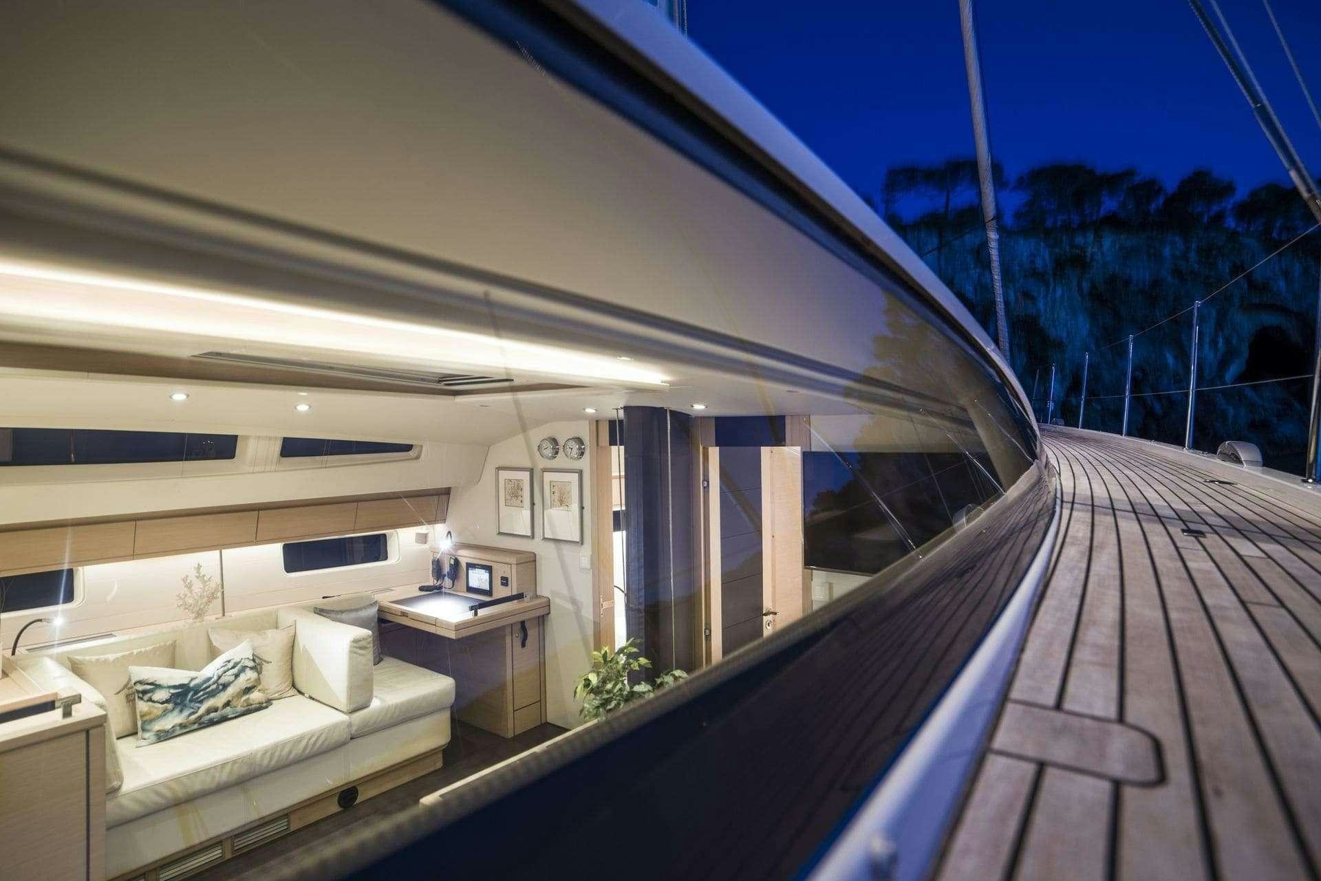 a house with a porch and a pool aboard THEA Yacht for Charter