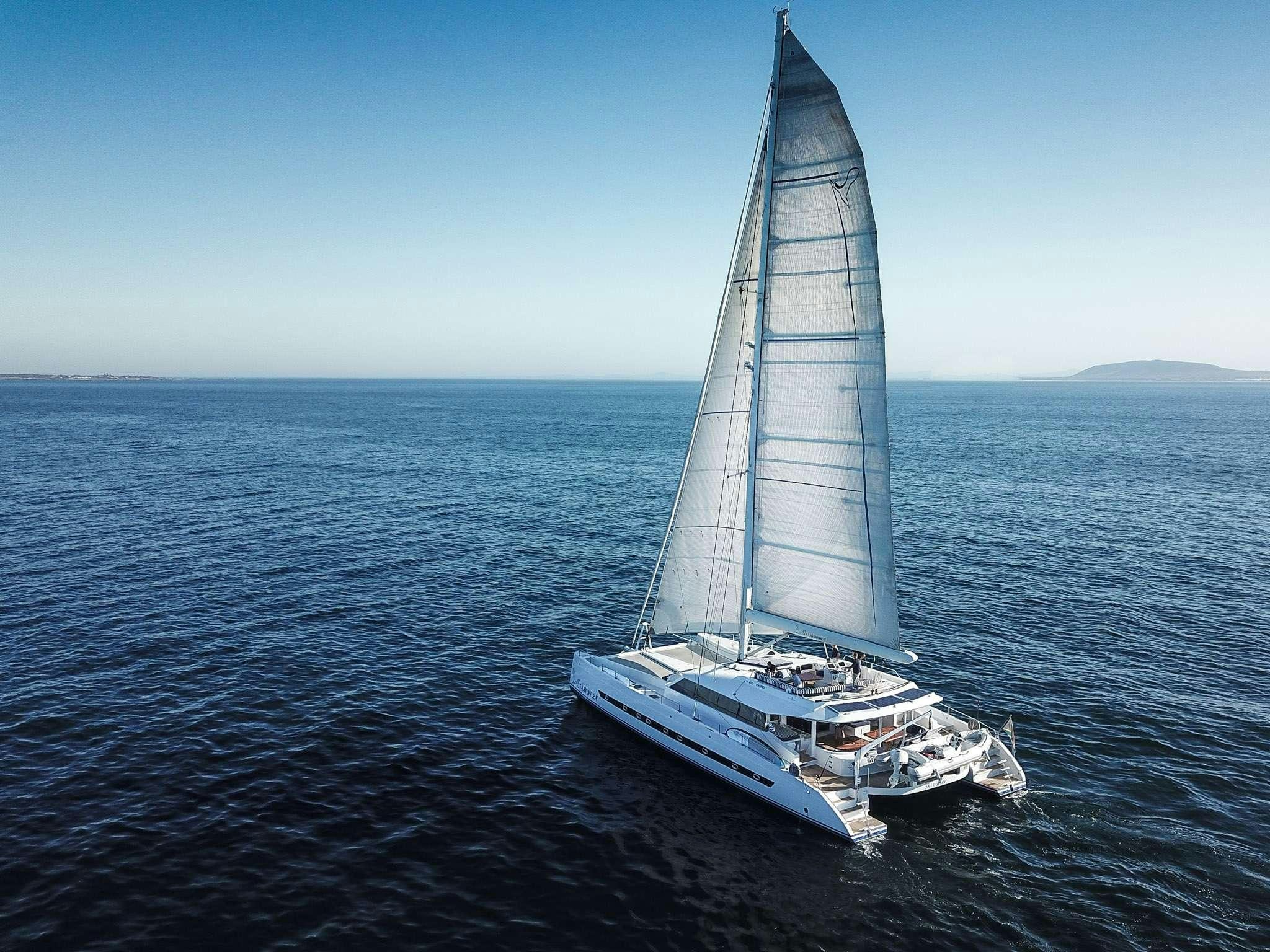 a sailboat on the water aboard SKIMMER Yacht for Charter