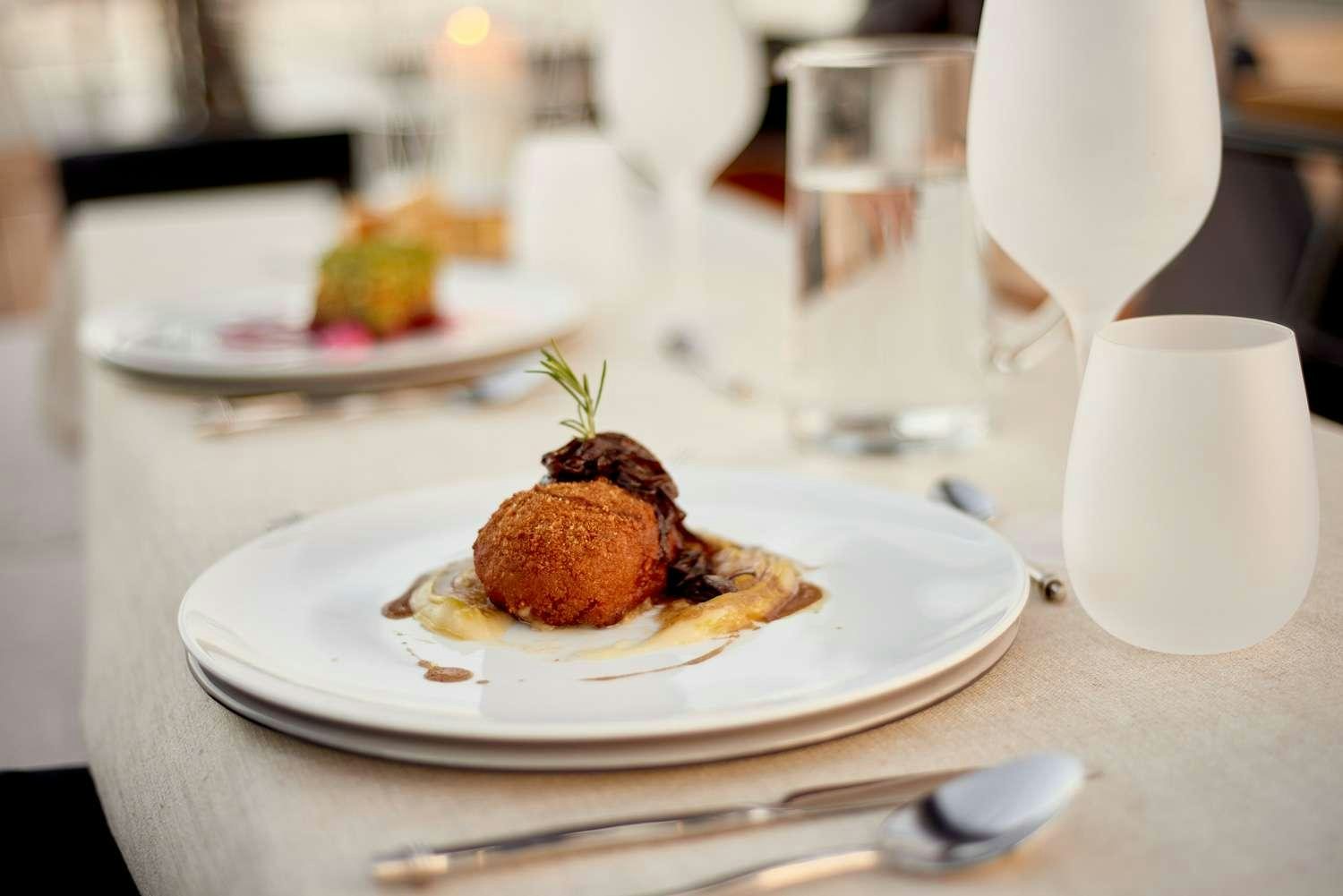 a plate of food aboard AORI Yacht for Charter