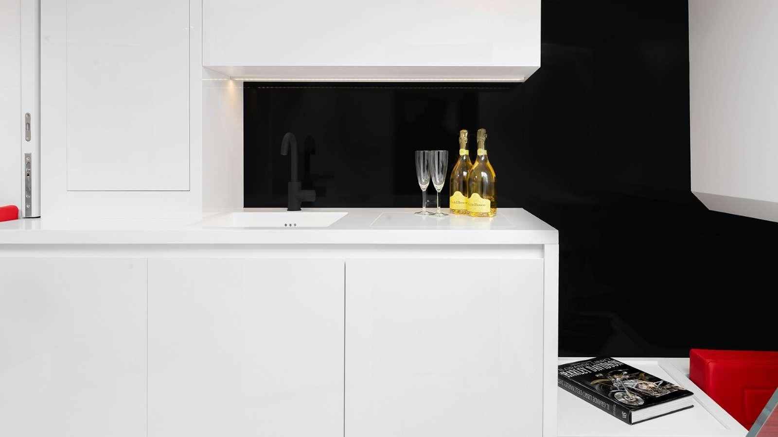 a bottle of liquor on a counter aboard 48 Van Dutch  Yacht for Charter