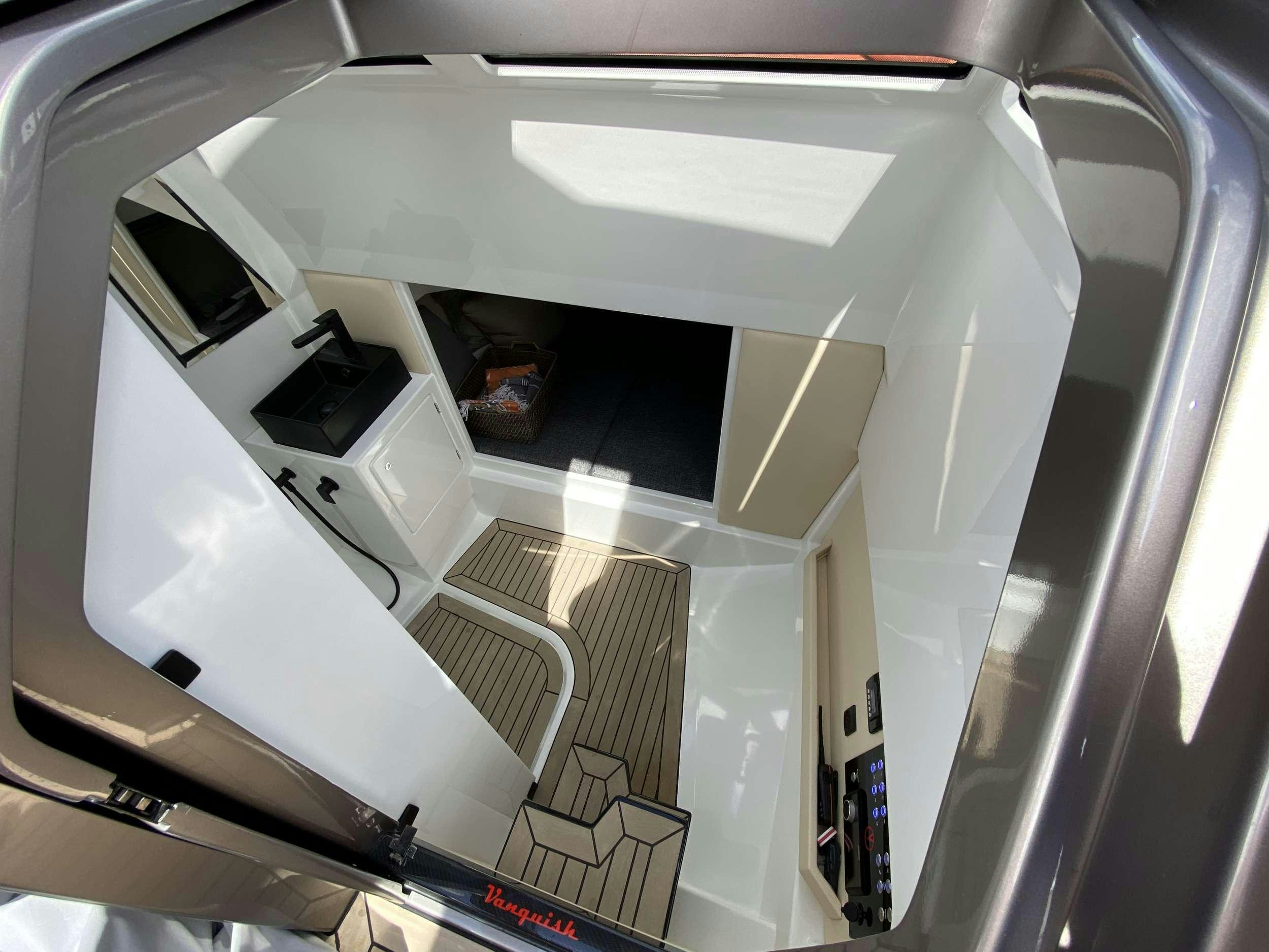 a white machine with a vent aboard Money Penny  Yacht for Charter