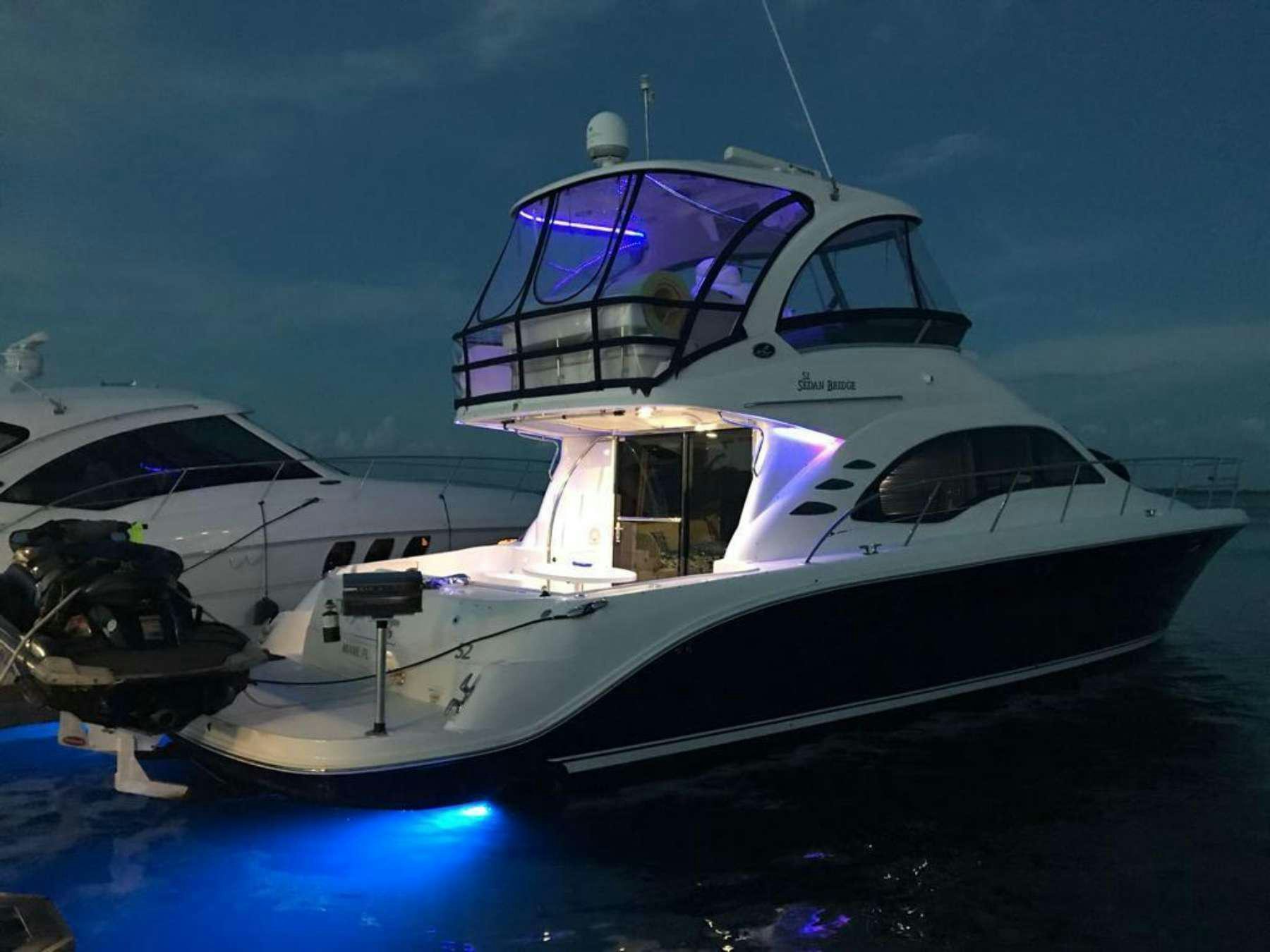 a large white yacht aboard Champagne  Yacht for Charter