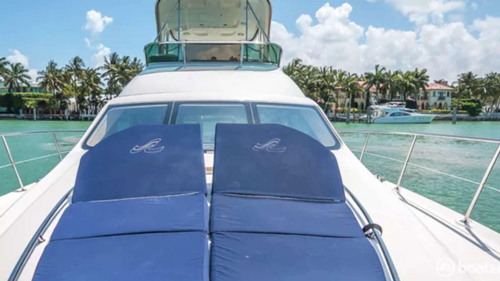 a car on a road aboard Champagne  Yacht for Charter