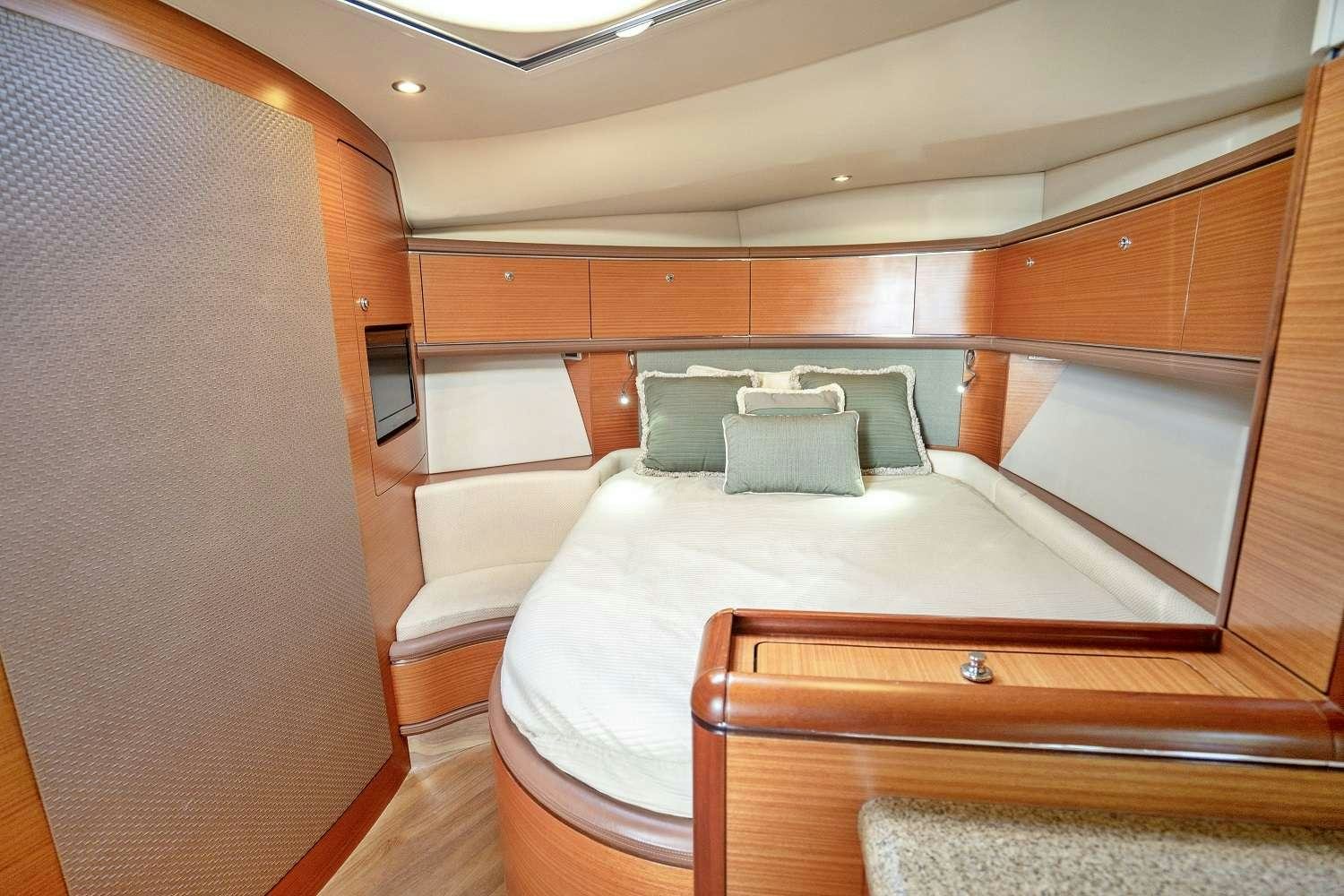 a bed in a room aboard GUCCI Yacht for Charter