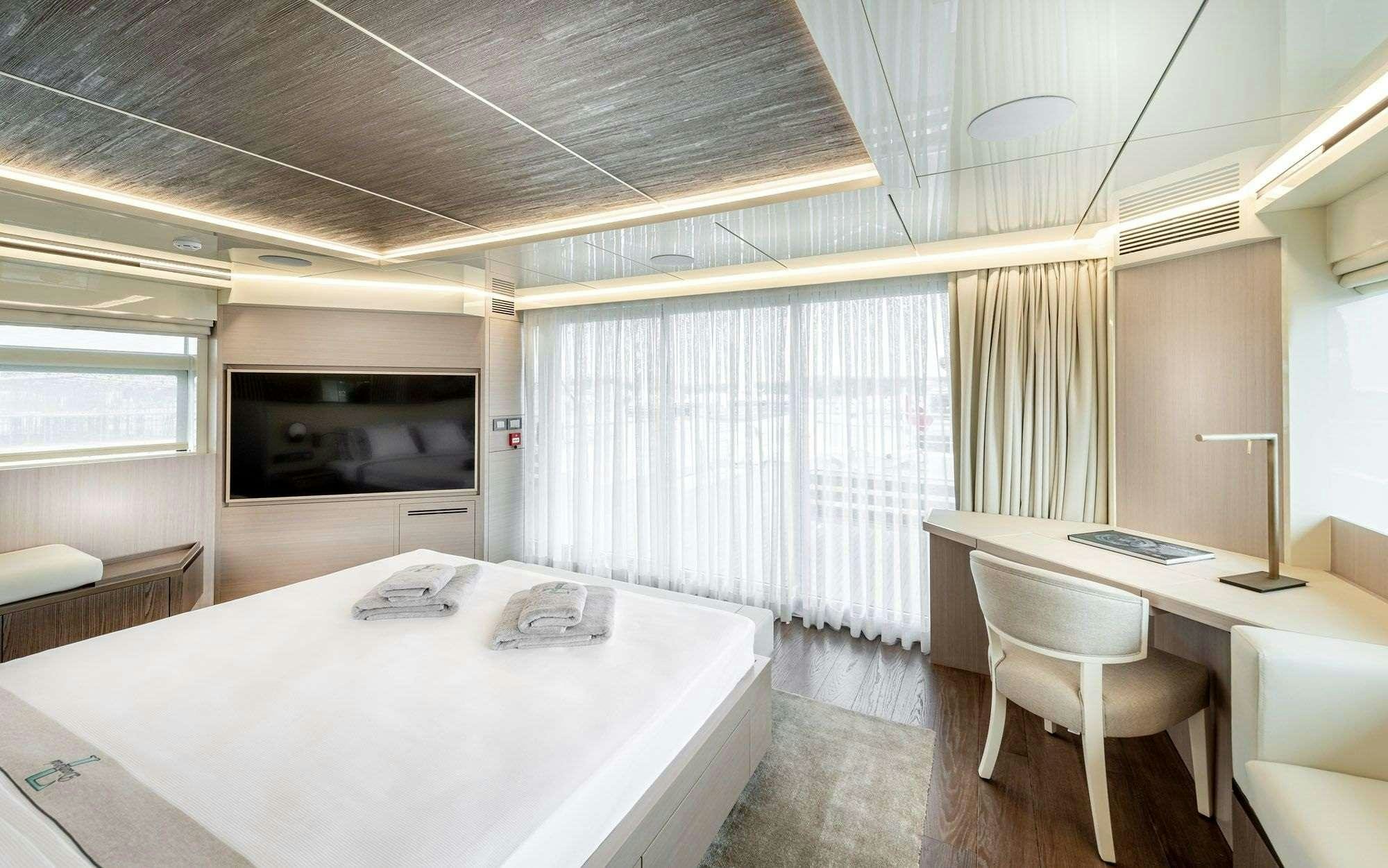 a room with a table and chairs aboard ZARANIA Yacht for Charter