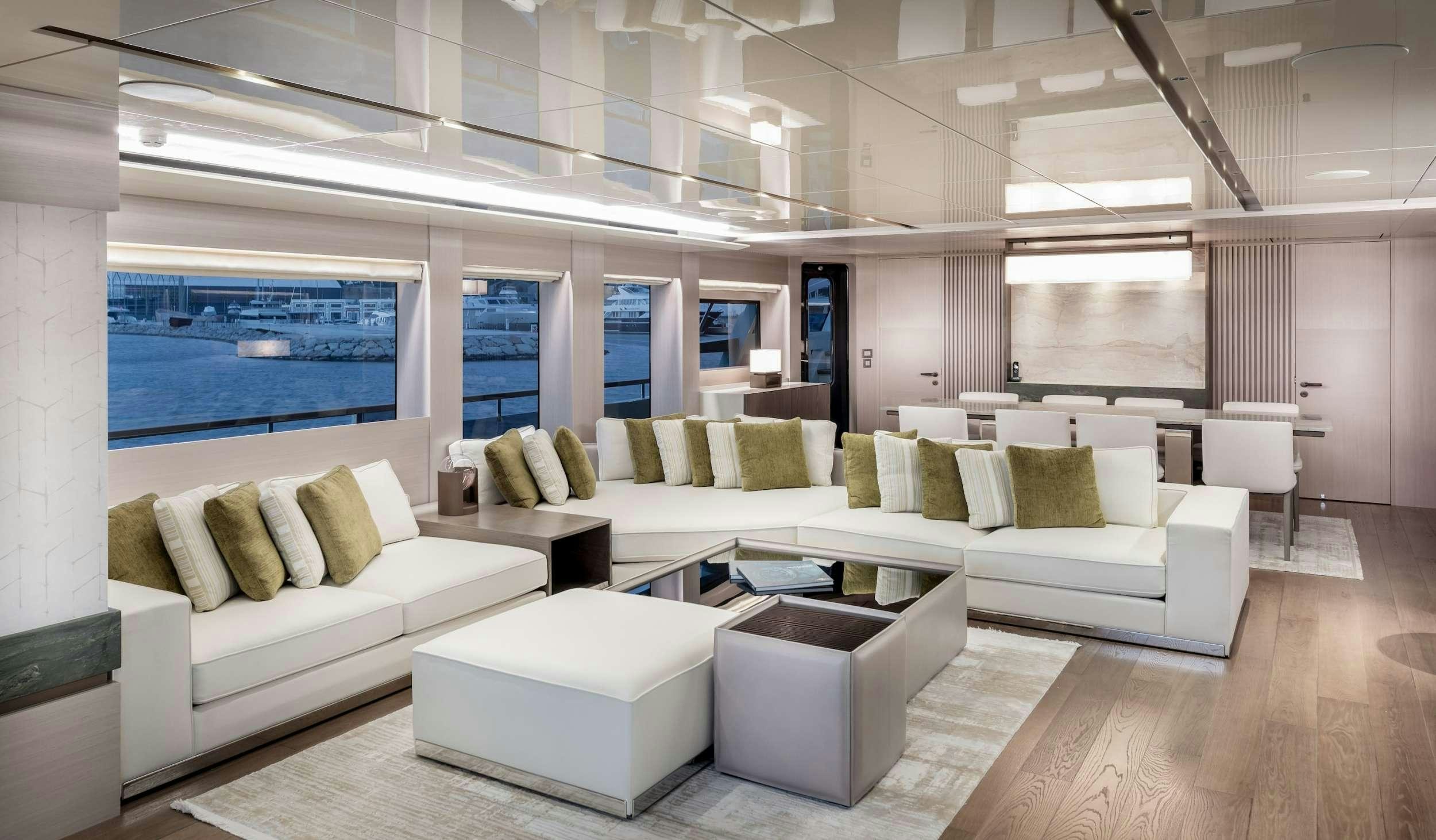 a living room with a large window aboard ZARANIA Yacht for Charter