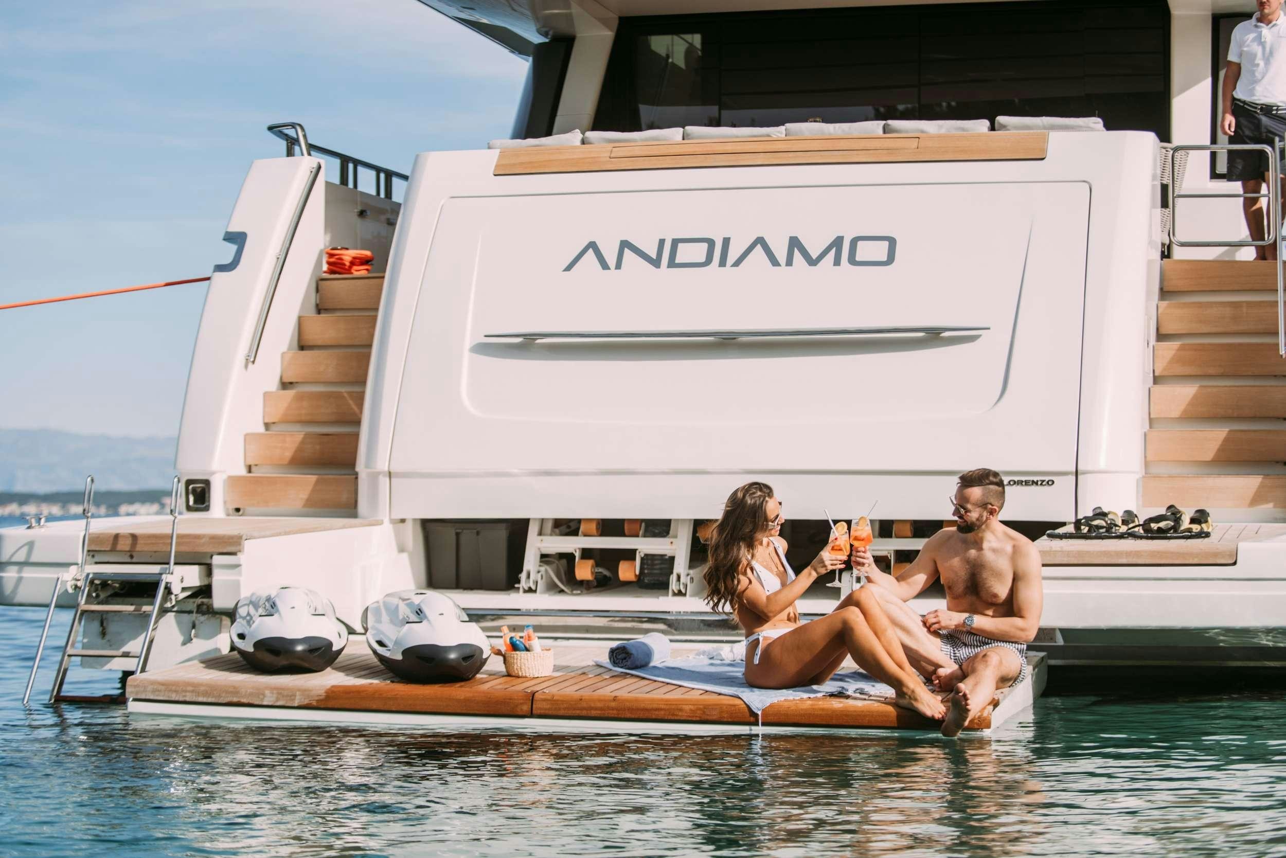 a group of people sitting on a boat in the water aboard ANDIAMO Yacht for Charter
