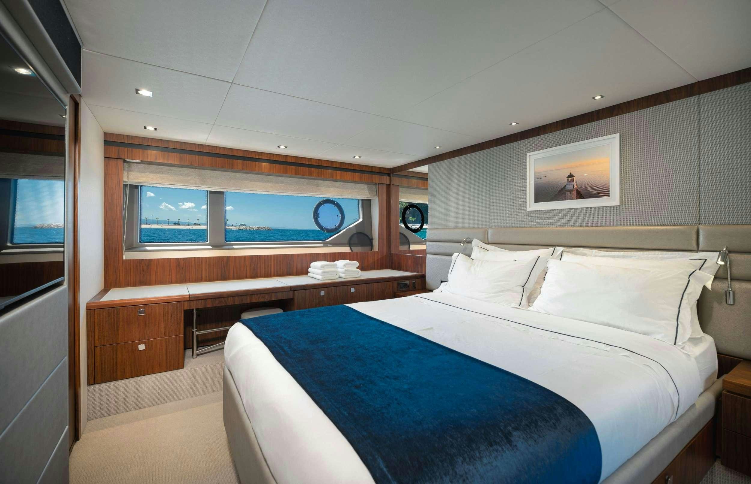 a bed in a room aboard HIDEAWAY Yacht for Charter