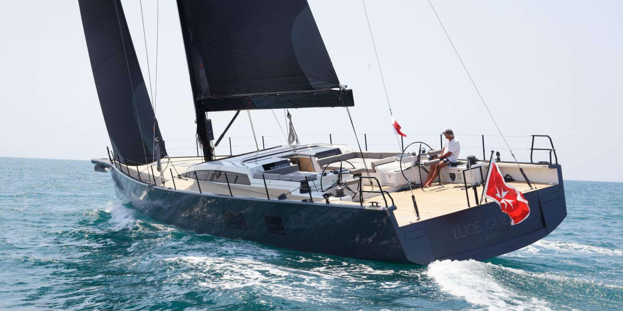 a person sailing on a boat aboard LUCE GUIDA Yacht for Charter
