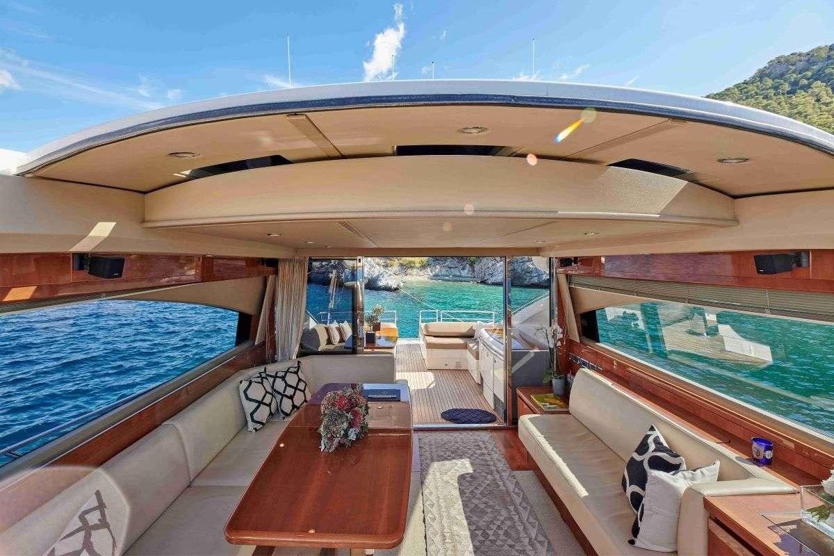 a large living room with a pool aboard ESTIA ONE Yacht for Charter