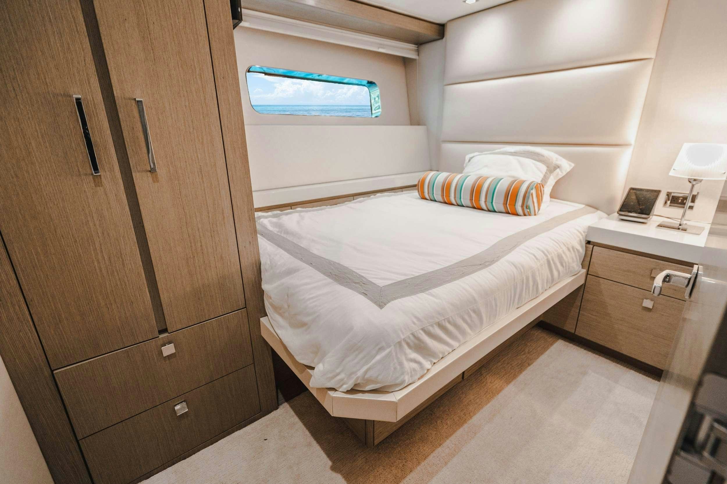a bed in a room aboard BELLA SKY Yacht for Charter