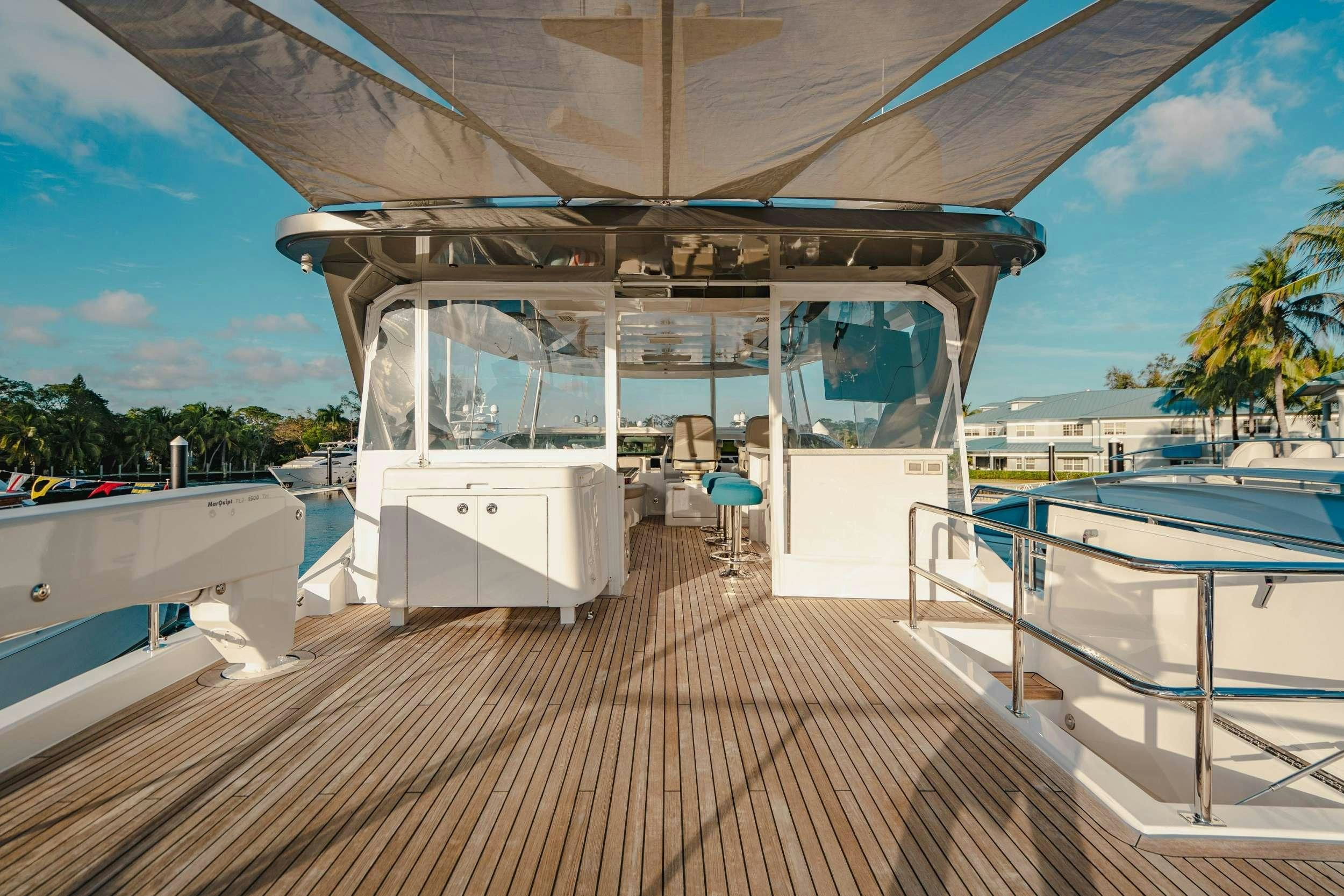 a boat on a dock aboard BELLA SKY Yacht for Charter
