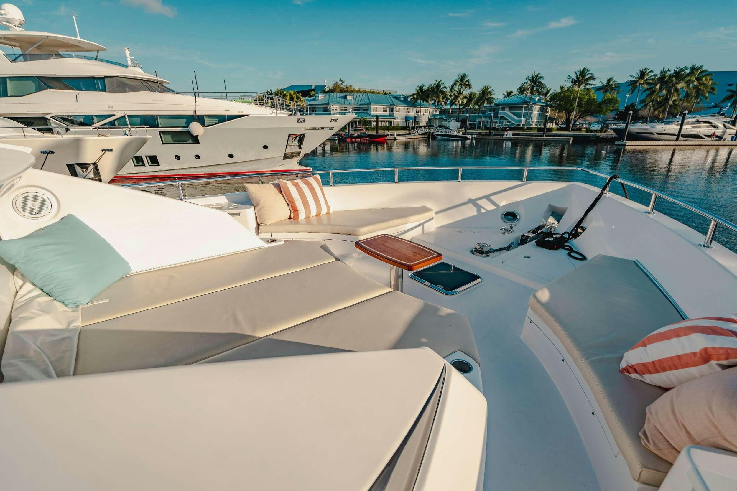 a group of boats are parked in a marina aboard BELLA SKY Yacht for Charter