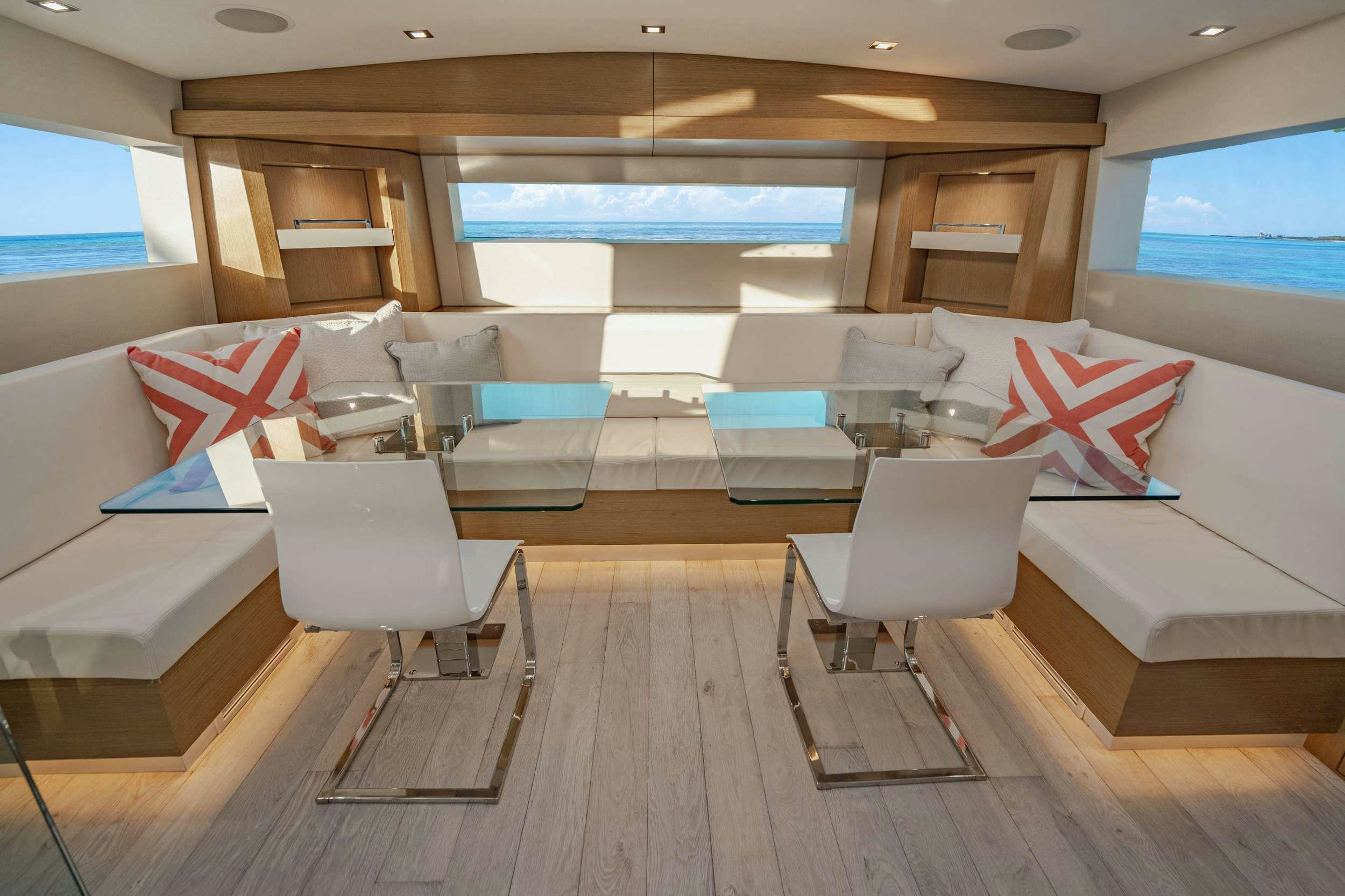 a room with a couch and a table aboard BELLA SKY Yacht for Charter