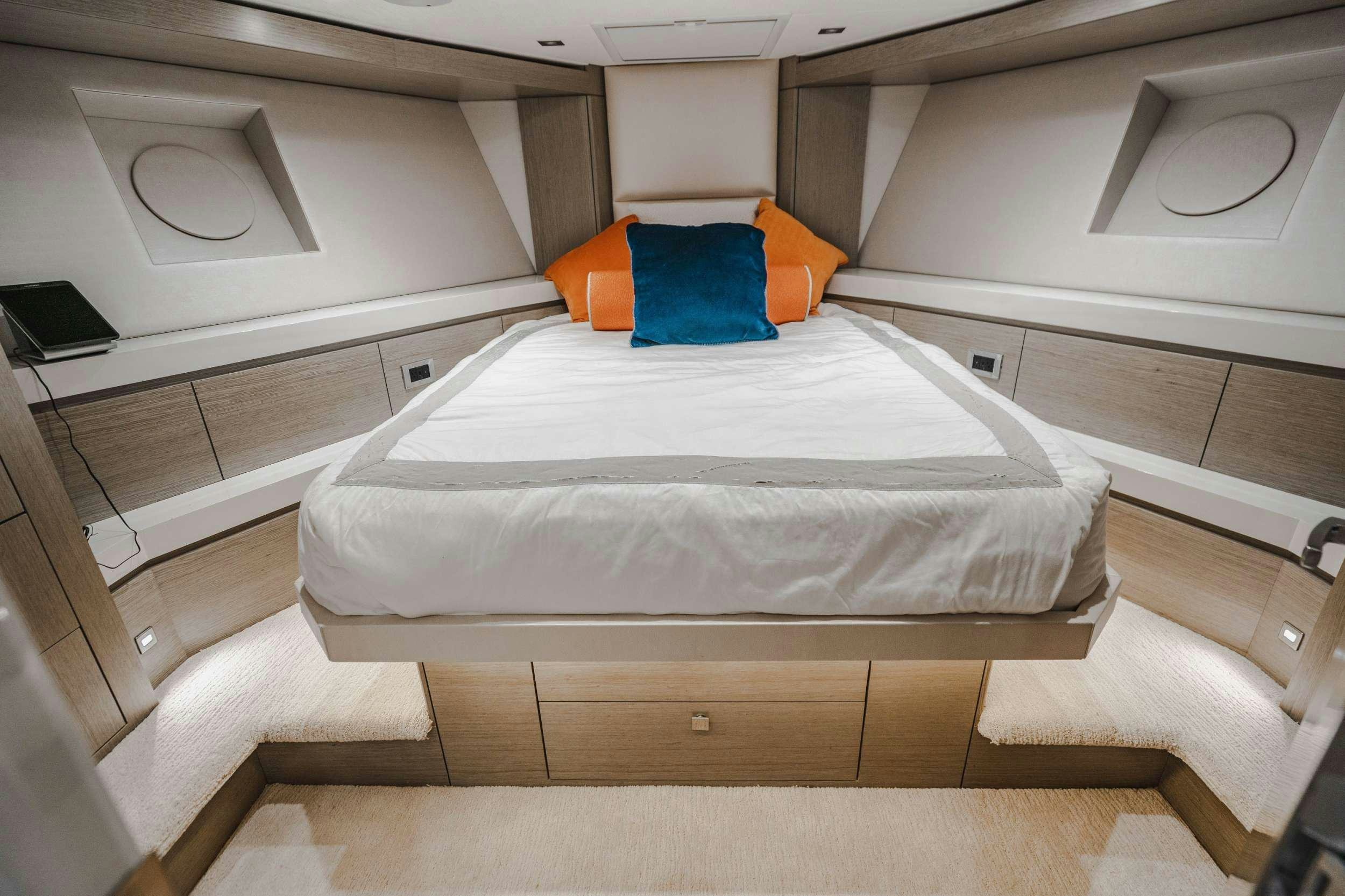 a bed in a room aboard BELLA SKY Yacht for Charter