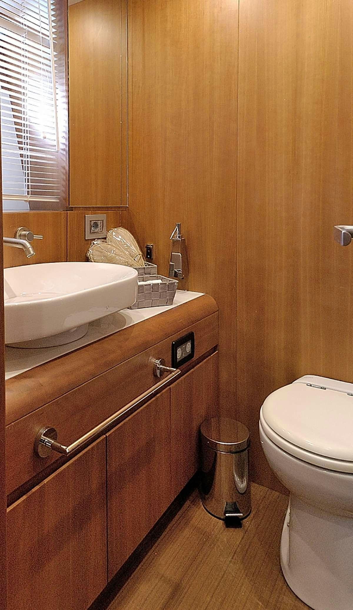a bathroom with a sink and a toilet aboard FUNSEA Yacht for Charter
