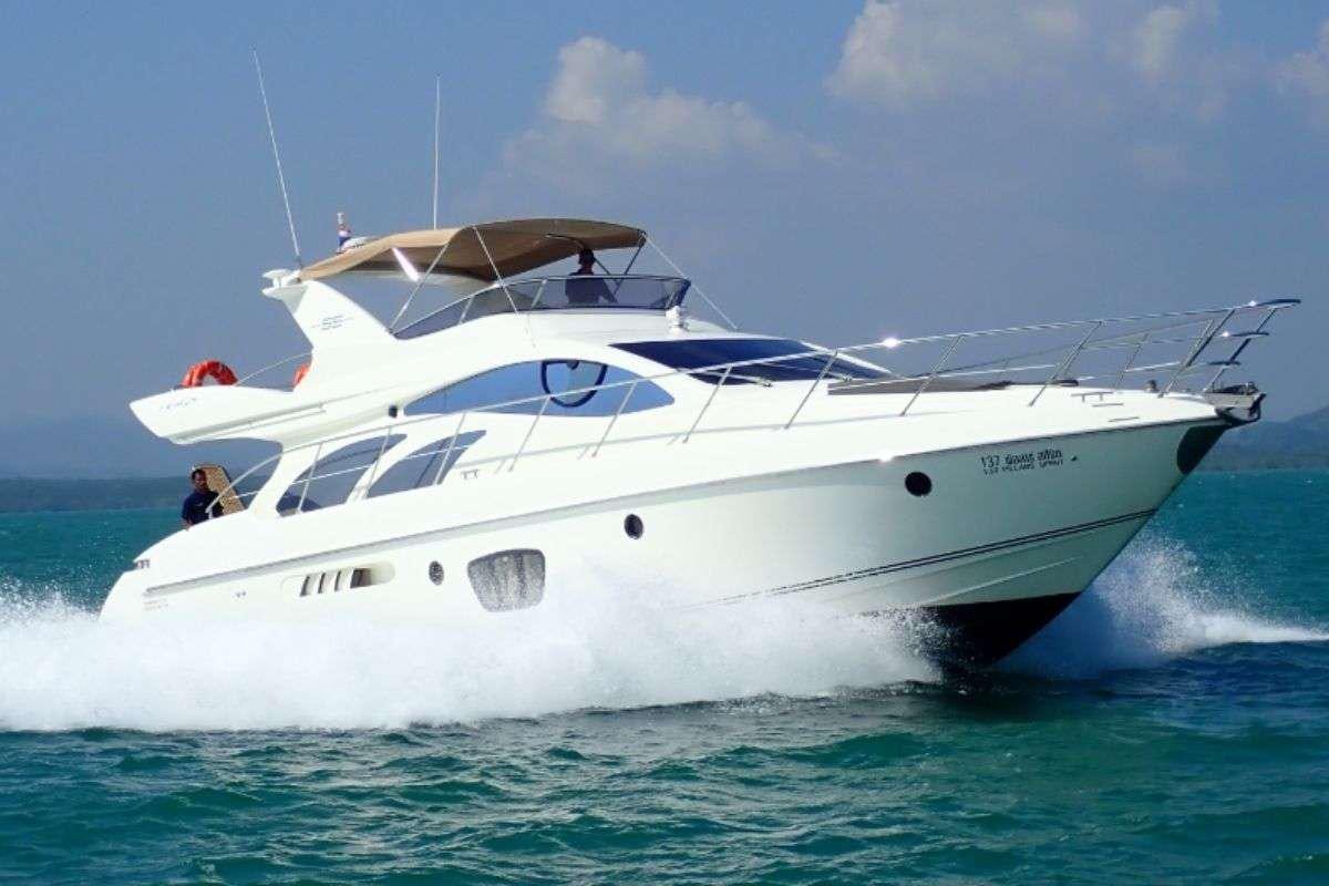 a white yacht in the water aboard 137 PILLARS SPIRIT Yacht for Charter