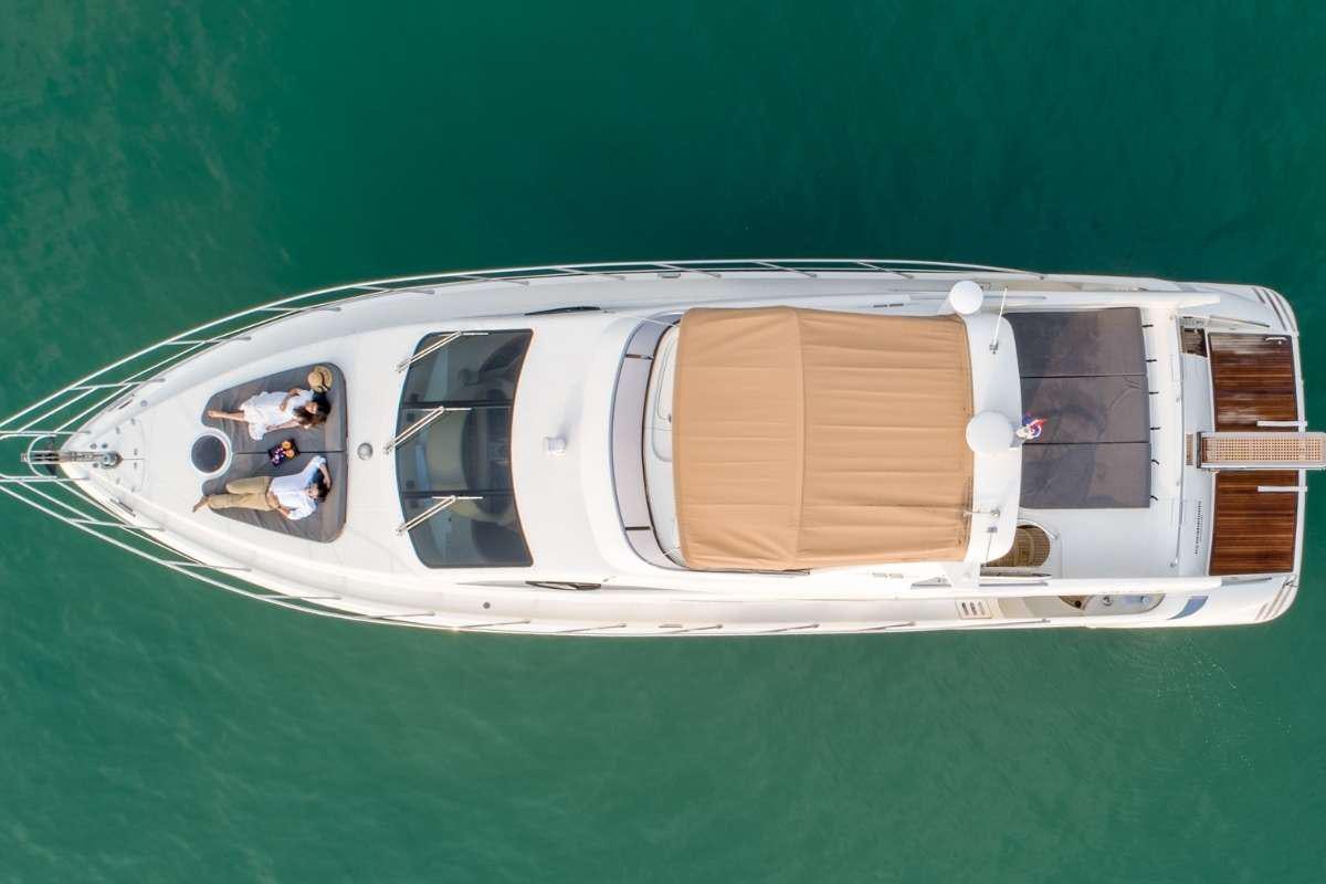 a small white boat aboard 137 PILLARS SPIRIT Yacht for Charter