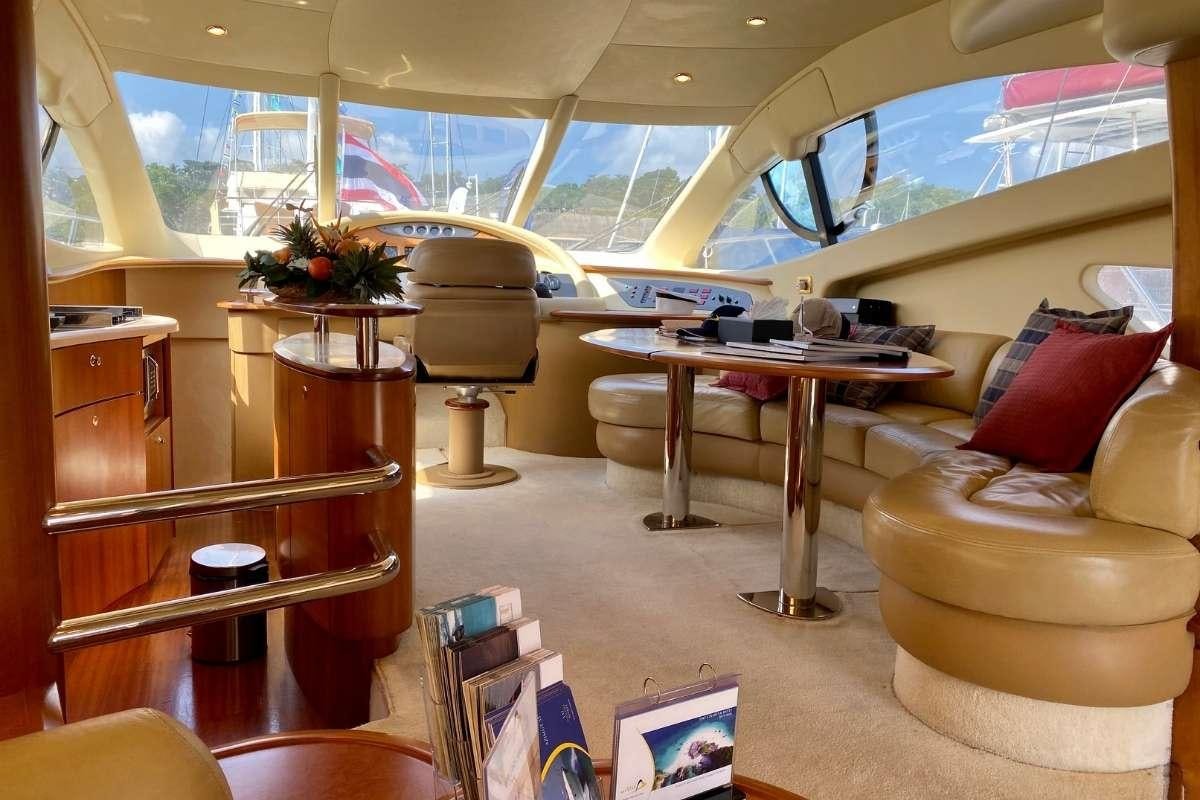 inside of a room with a table and chairs aboard 137 PILLARS SPIRIT Yacht for Charter