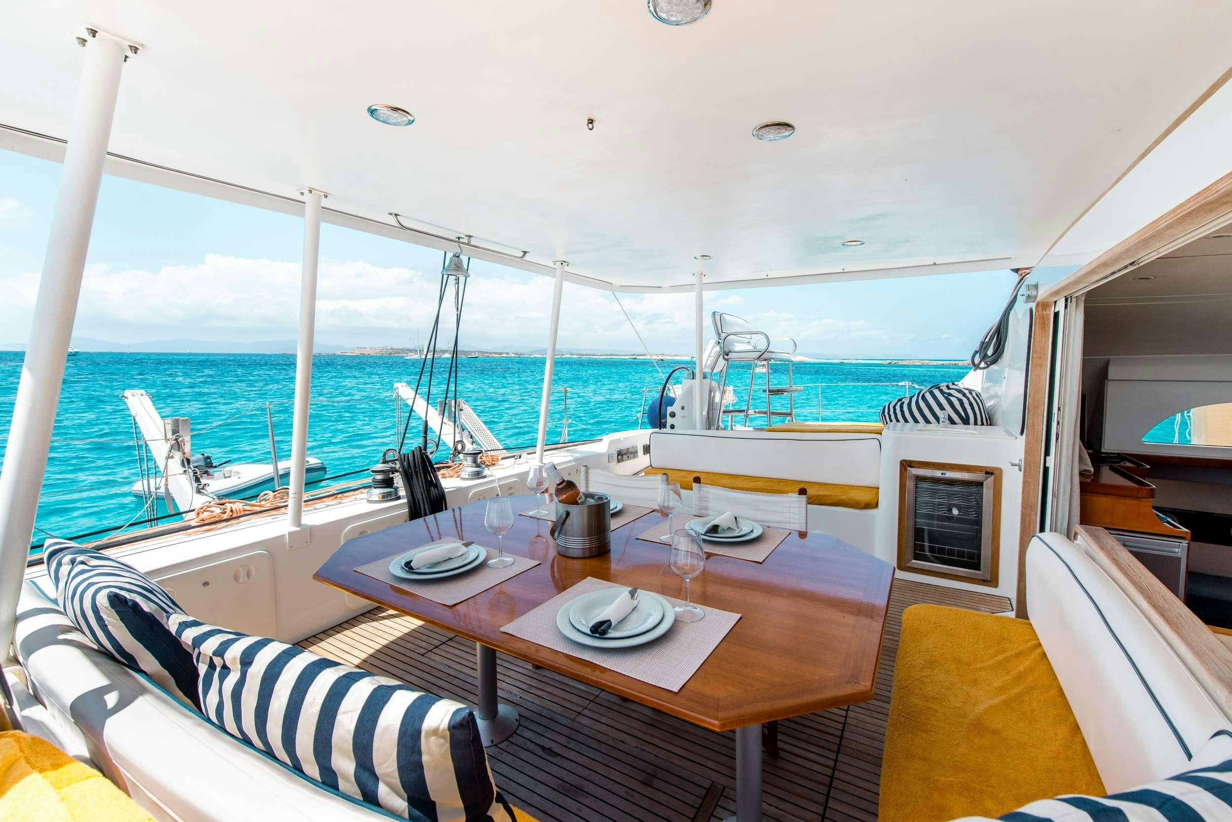 a table on a boat aboard JOVA Yacht for Charter