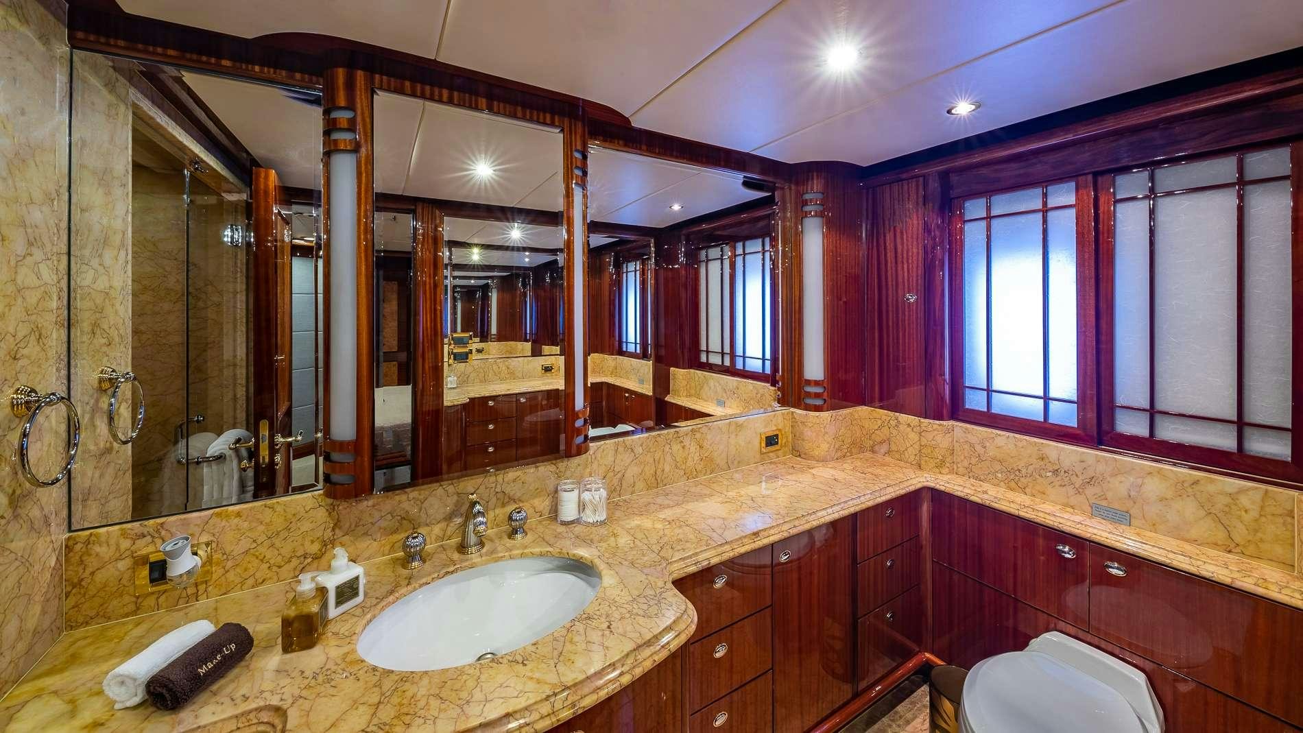 a bathroom with a large mirror aboard LADY LEILA Yacht for Charter