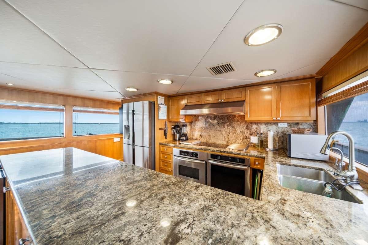 a kitchen with granite counter tops aboard OCEAN DRIVE Yacht for Charter