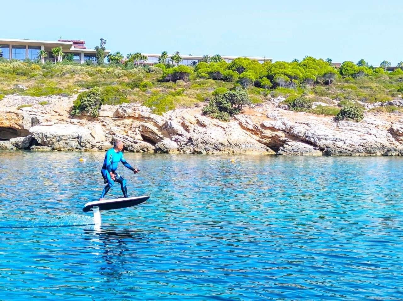 a person surfing on the water aboard MERIDIAN ADVENTURE Yacht for Charter