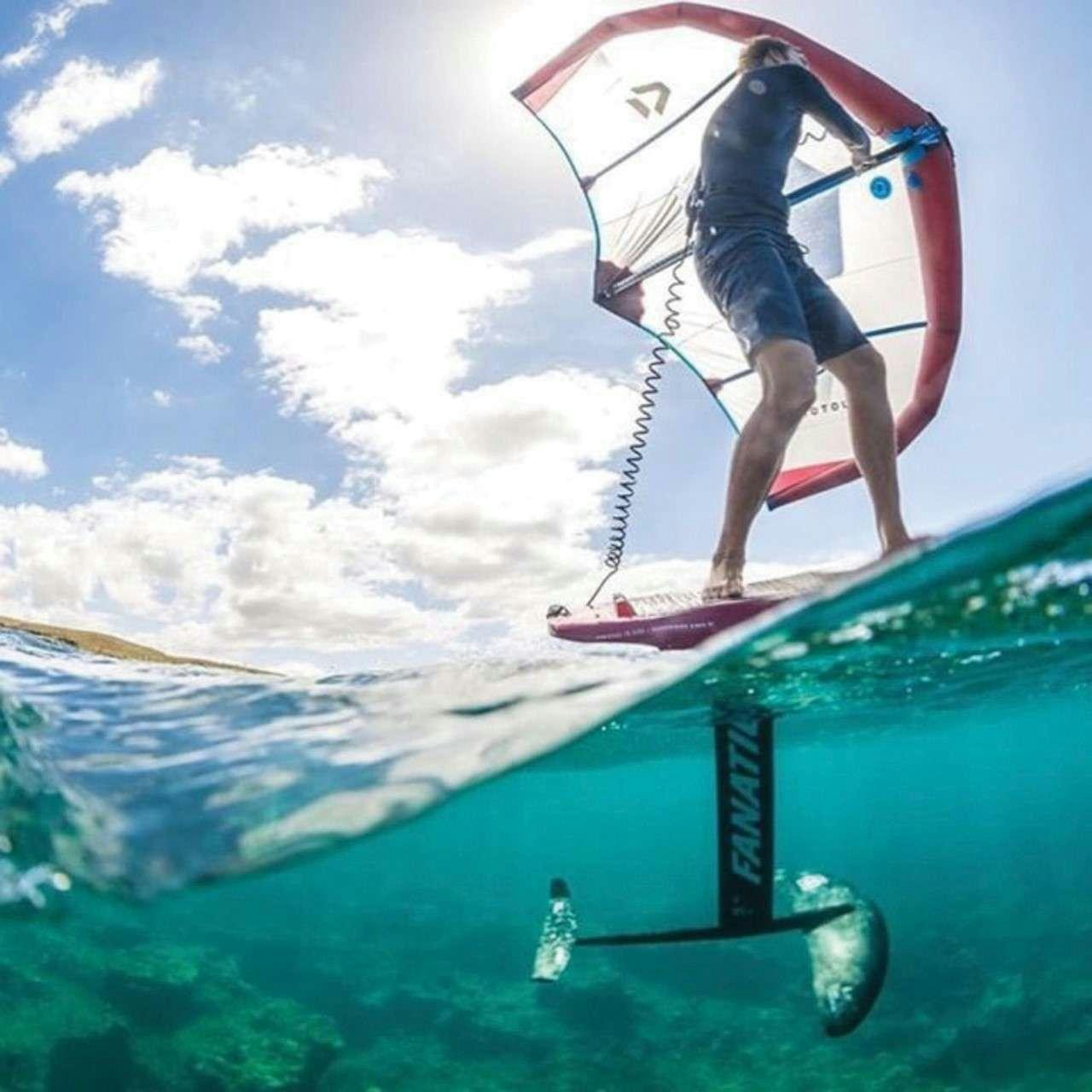 a man jumping off a diving board aboard MERIDIAN ADVENTURE Yacht for Charter