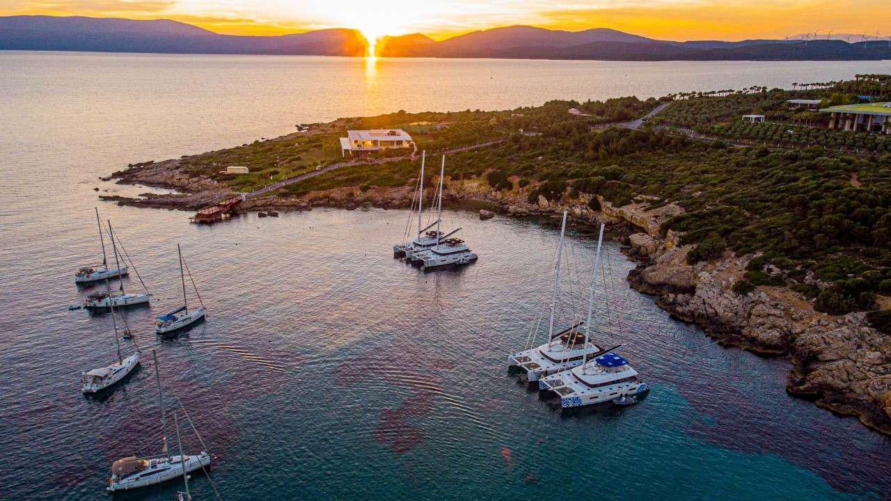a group of boats in a bay aboard MERIDIAN ADVENTURE Yacht for Charter