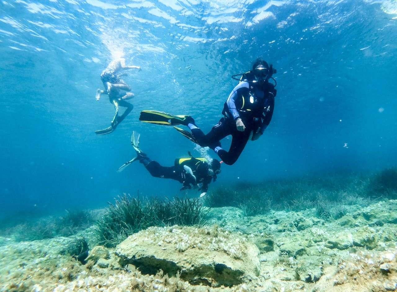 a scuba diver in the water aboard MERIDIAN ADVENTURE Yacht for Charter